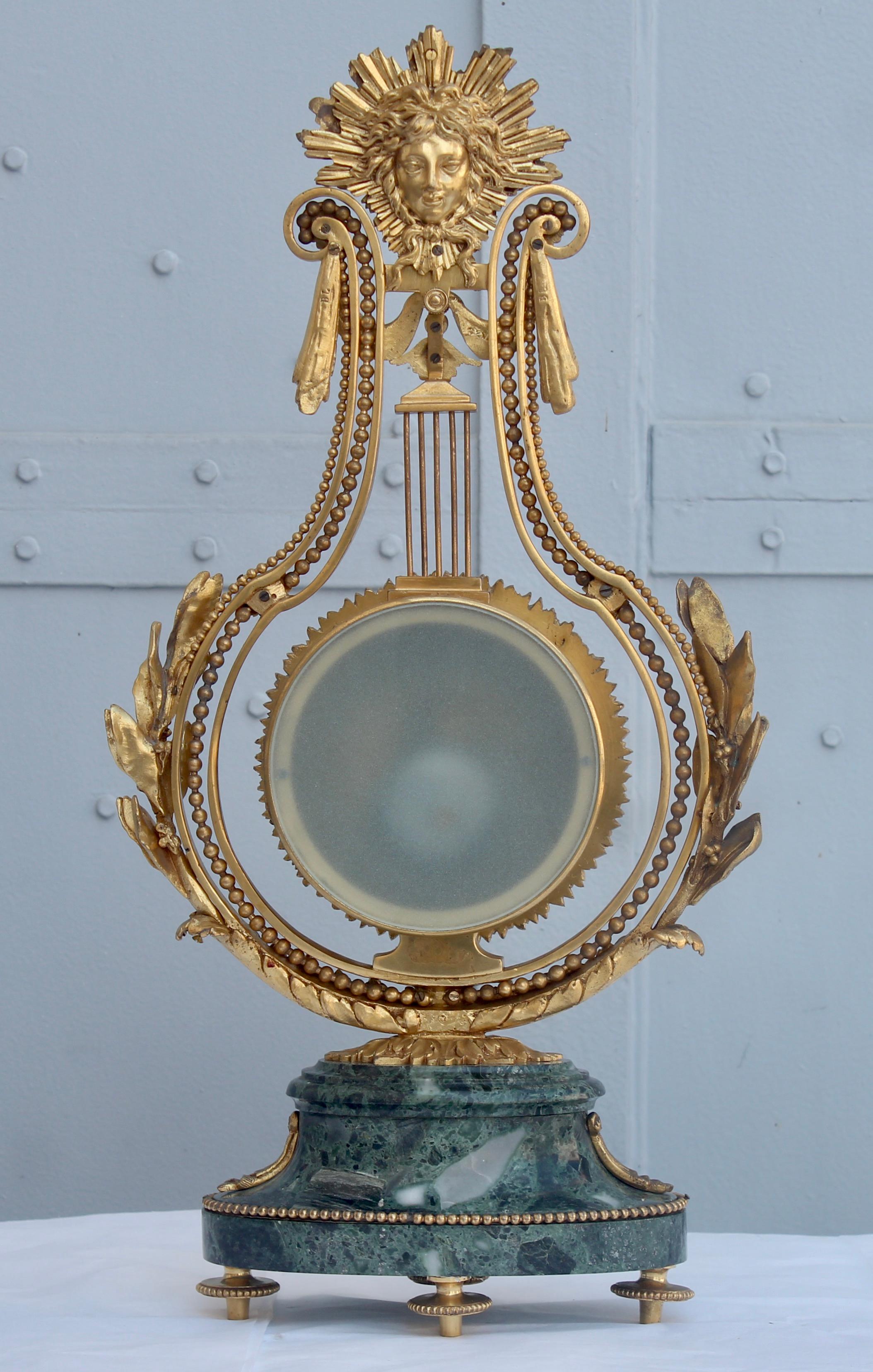 Late 19th Century 19th Century French Ormolu and Marble Three-Piece Lyre Shaped Clock Garniture