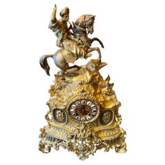 Reloj de manto francés de ormolu del siglo XIX con motivos orientalistas