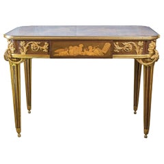 Table centrale en marqueterie montée en bronze doré du 19ème siècle par E. Khan & Cie.