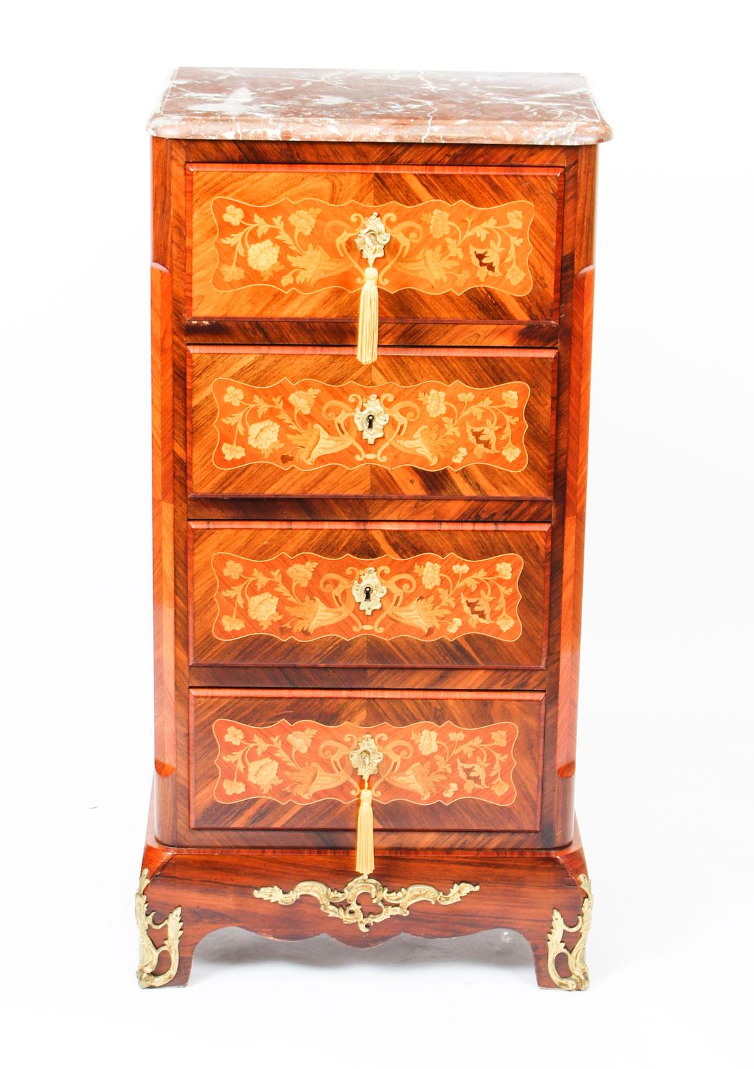 This is a beautiful antique French secretaire chest with fabulous floral marquetry decorations, circa 1860 in date. 

This piece was skillfully crafted in burr walnut and kingwood and features superb ormolu mounts.

The top drawer has a