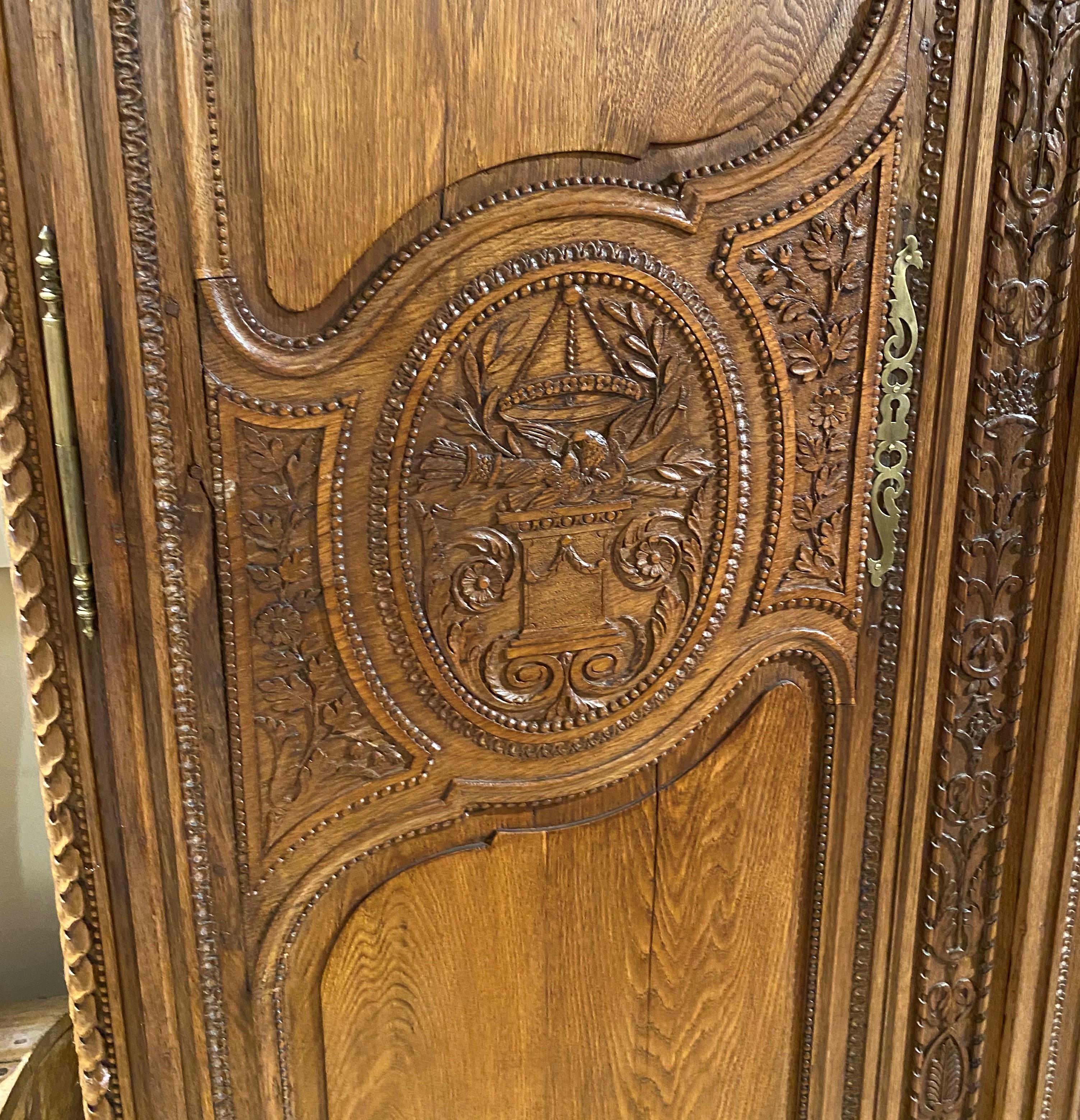 19th Century French Ornately Carved Oak Armoire In Good Condition In Milford, NH