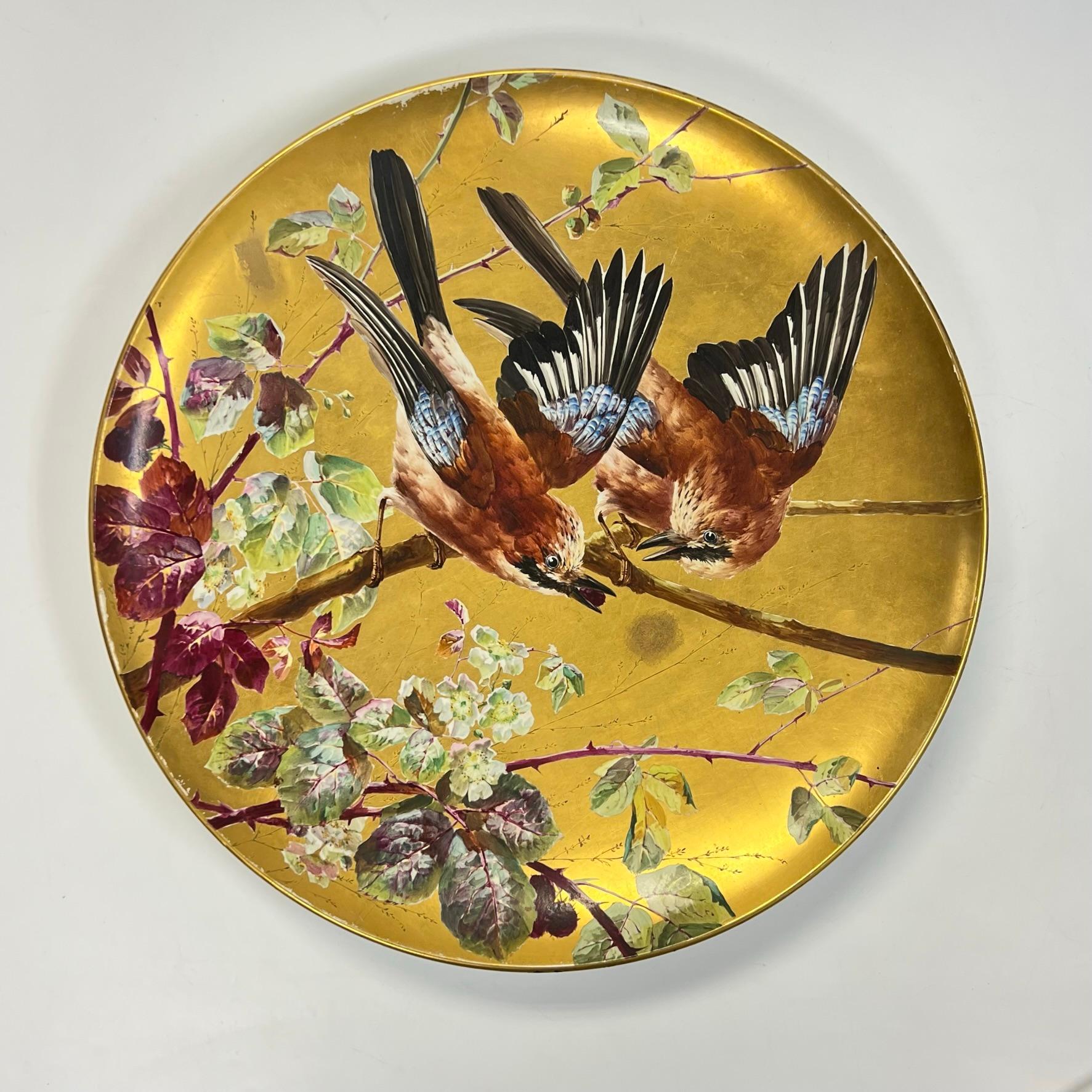 19th century French ornithological ceramic charger by Montereau B et Cie, depicting two perched songbirds.  In very good condition.