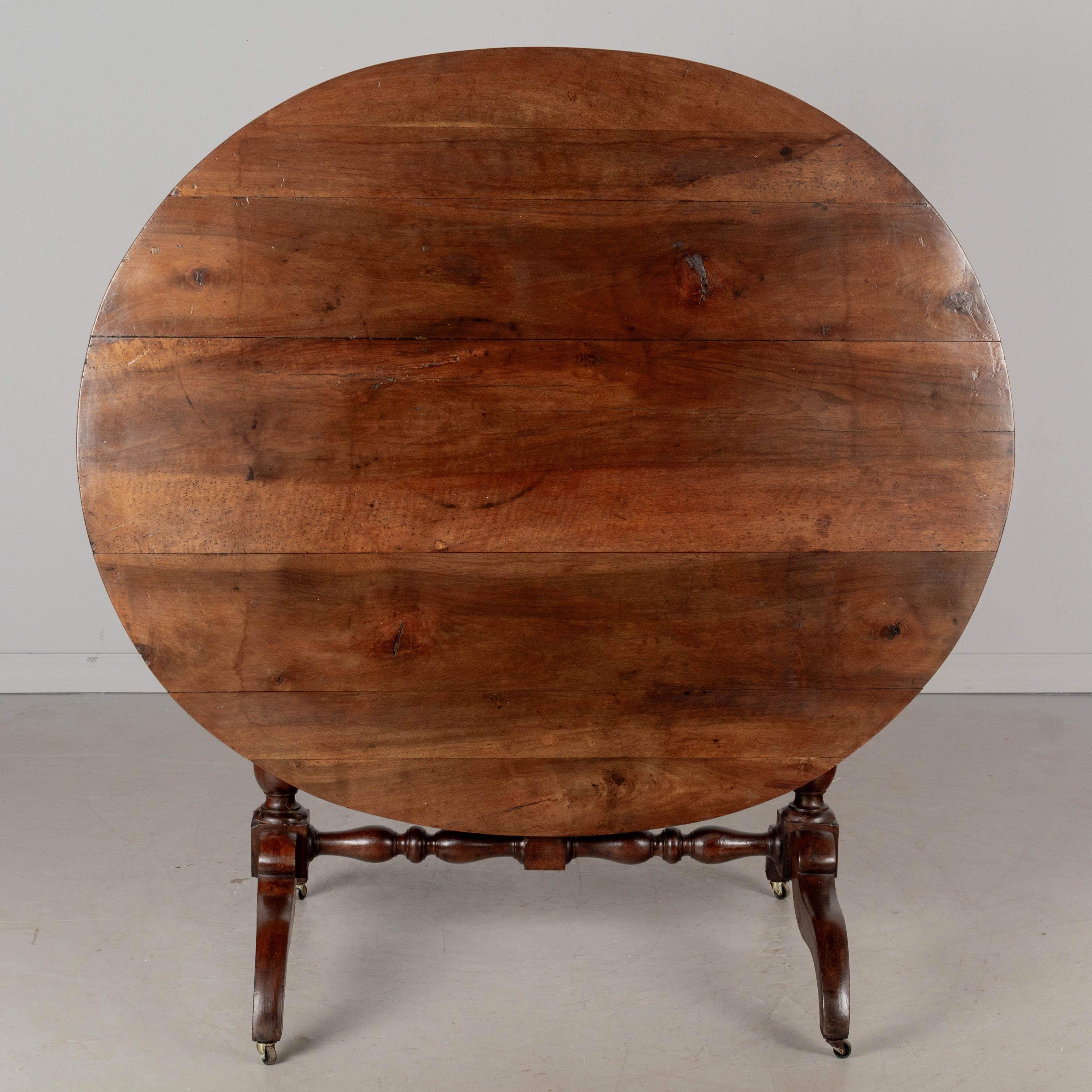 Turned 19th Century French Oval Dining Table or Tilt Top Table For Sale