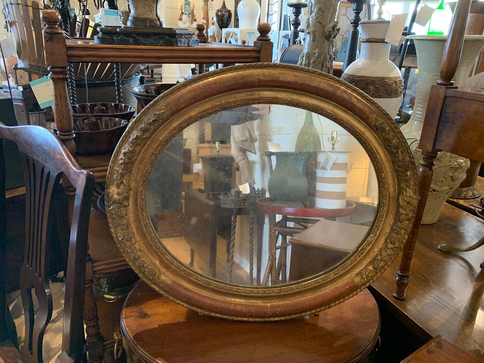 19th century French oval giltwood vanity mirror
Charming.