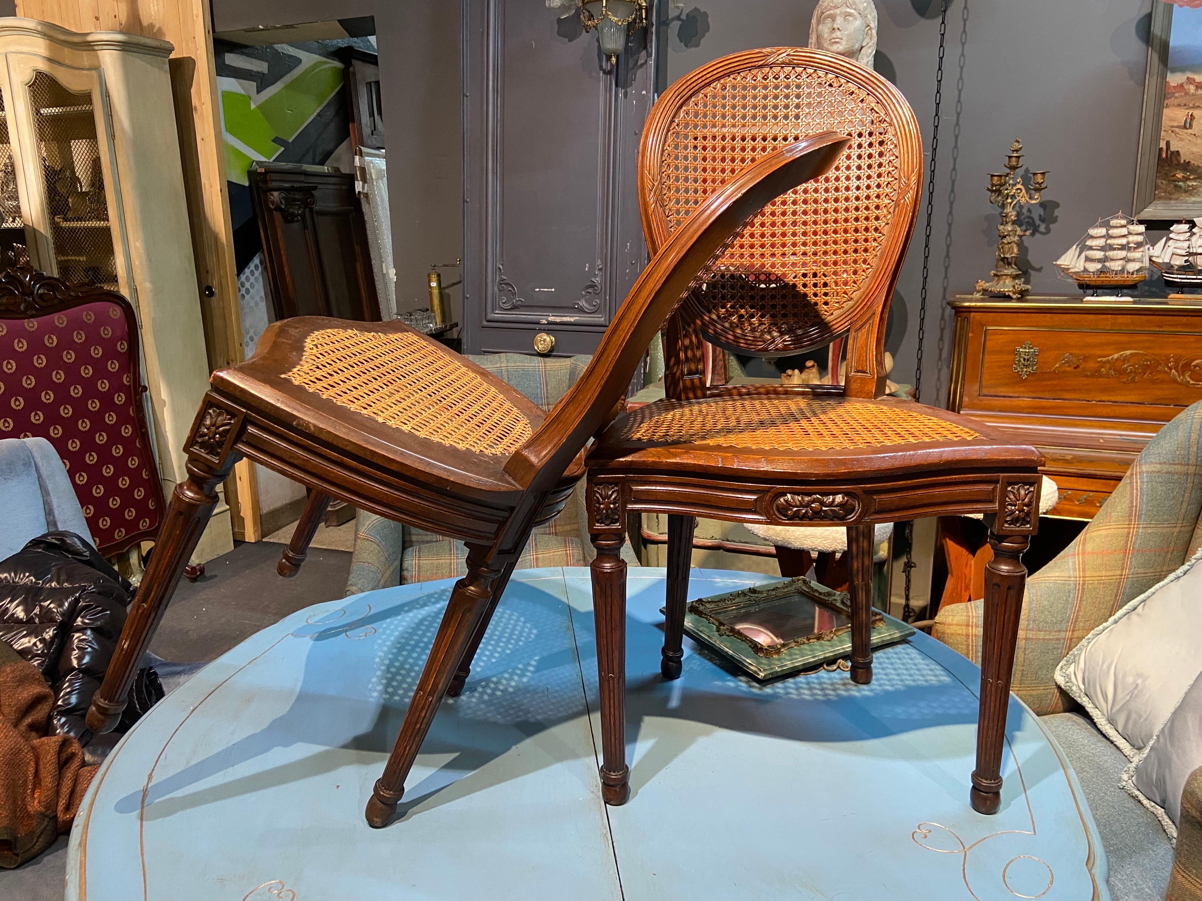 19th Century French Oval Hand Carved Walnut Cane Dining Chairs Louis XVI Style For Sale 8