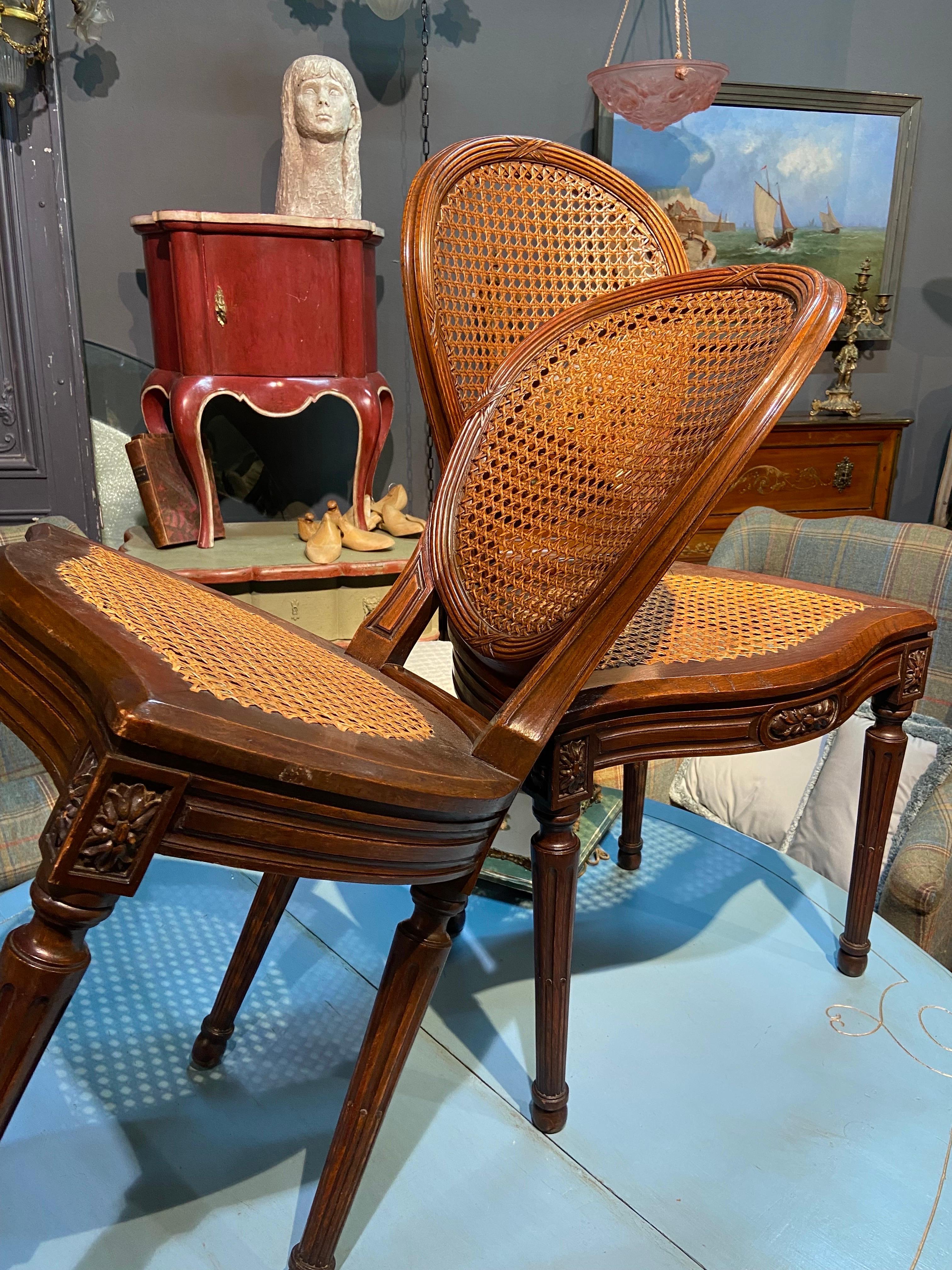 19th Century French Oval Hand Carved Walnut Cane Dining Chairs Louis XVI Style For Sale 9