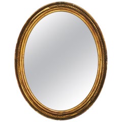 19th Century French Oval Mirror Gilded with Gold Leaf