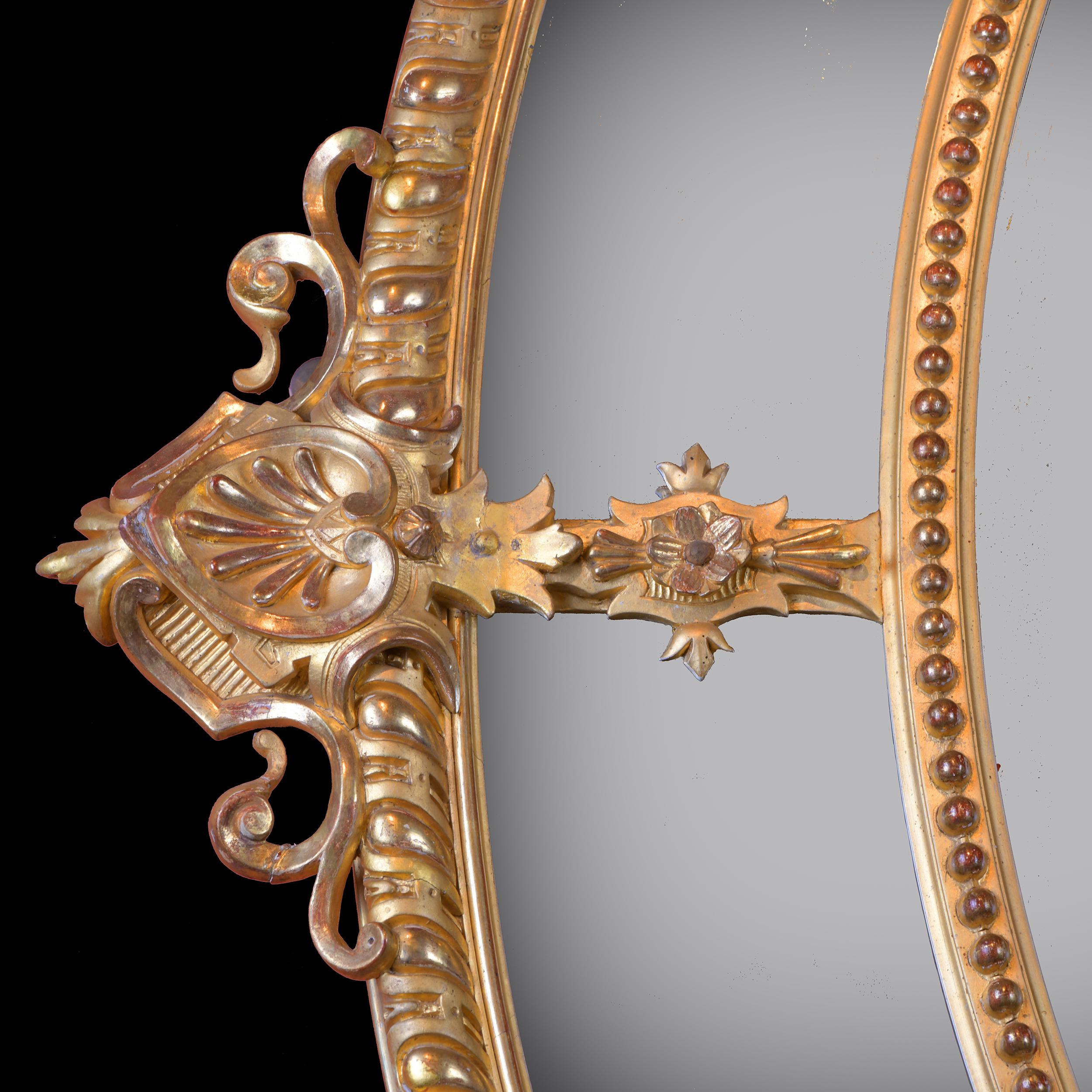 Hand-Carved 19th Century French Oval Shaped Antique Giltwood Wall Mirror