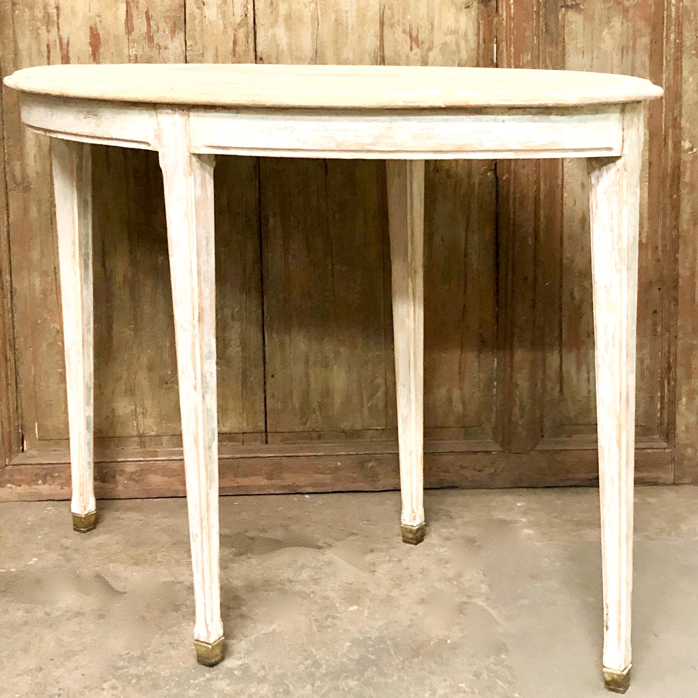 A charming 19th century French oval table scraped multiply layers of old paint with slender tapered legs and brass fittings.
More than ever, we selected the best, the rarest, the unusual, the spectacular, the most charming, what makes people