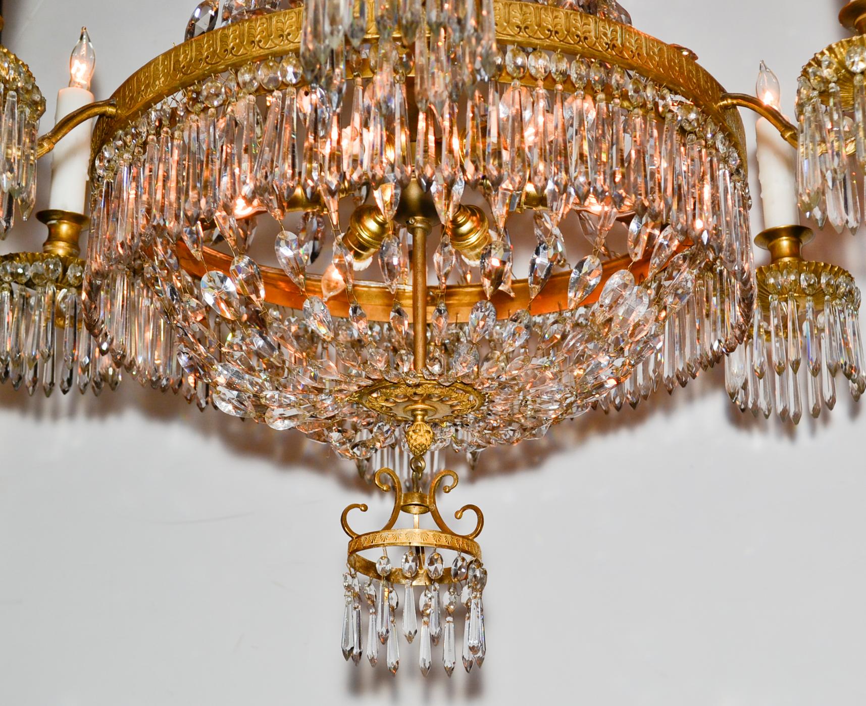 Great 19th century French pagoda inspired bronze and crystal 12-light chandelier.