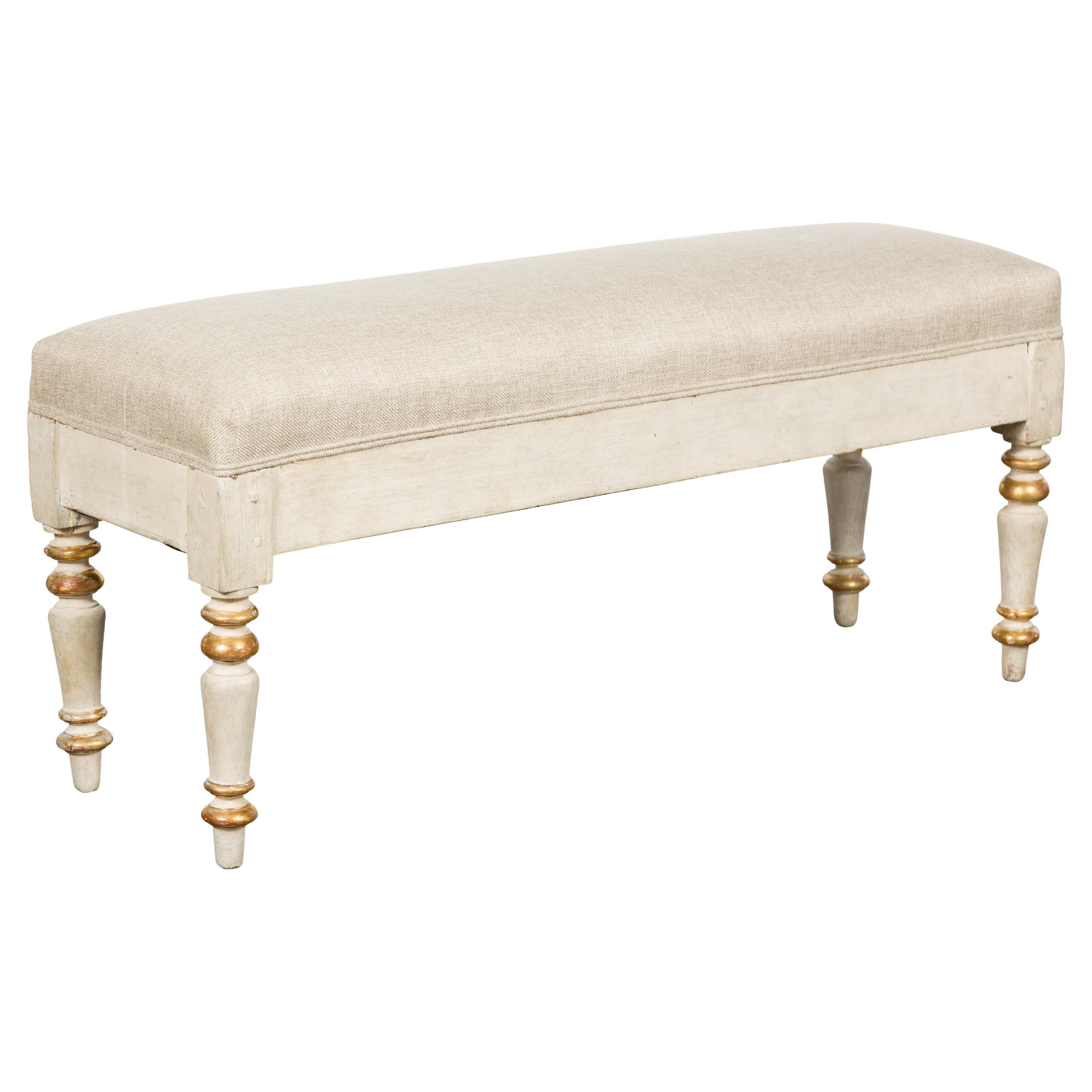 19th Century French Painted and Gilded Bench with Turned Legs and Upholstery For Sale