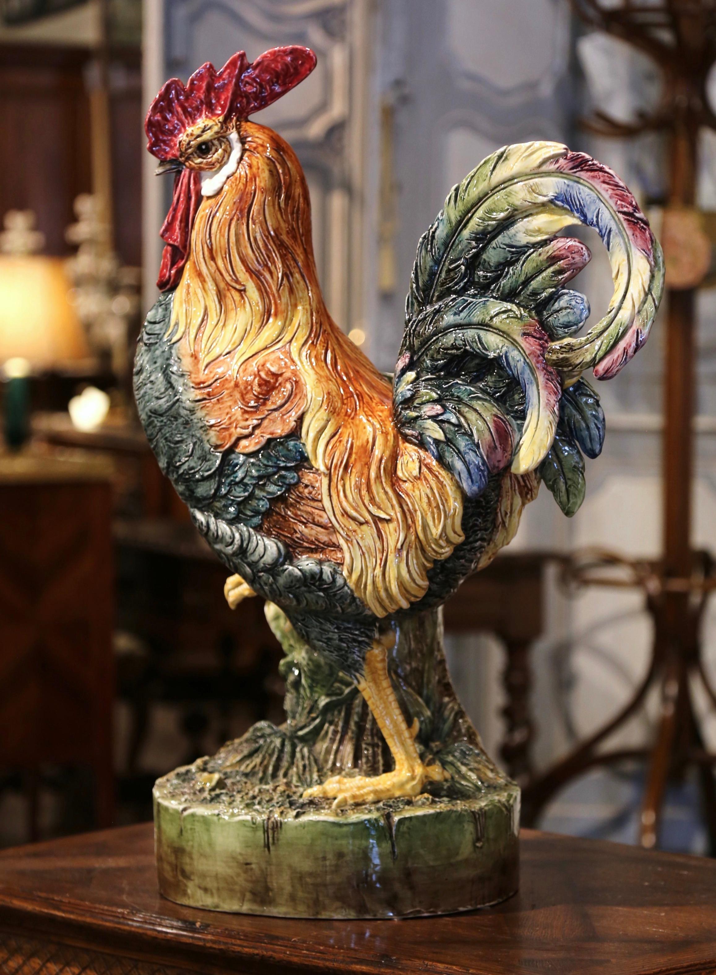Bring the country French style into your kitchen with this important antique rooster sculpture. Crafted in France circa 1890, and attributed to the Massier brothers, the tall faience chicken figure is a Classic French country home accessory. The
