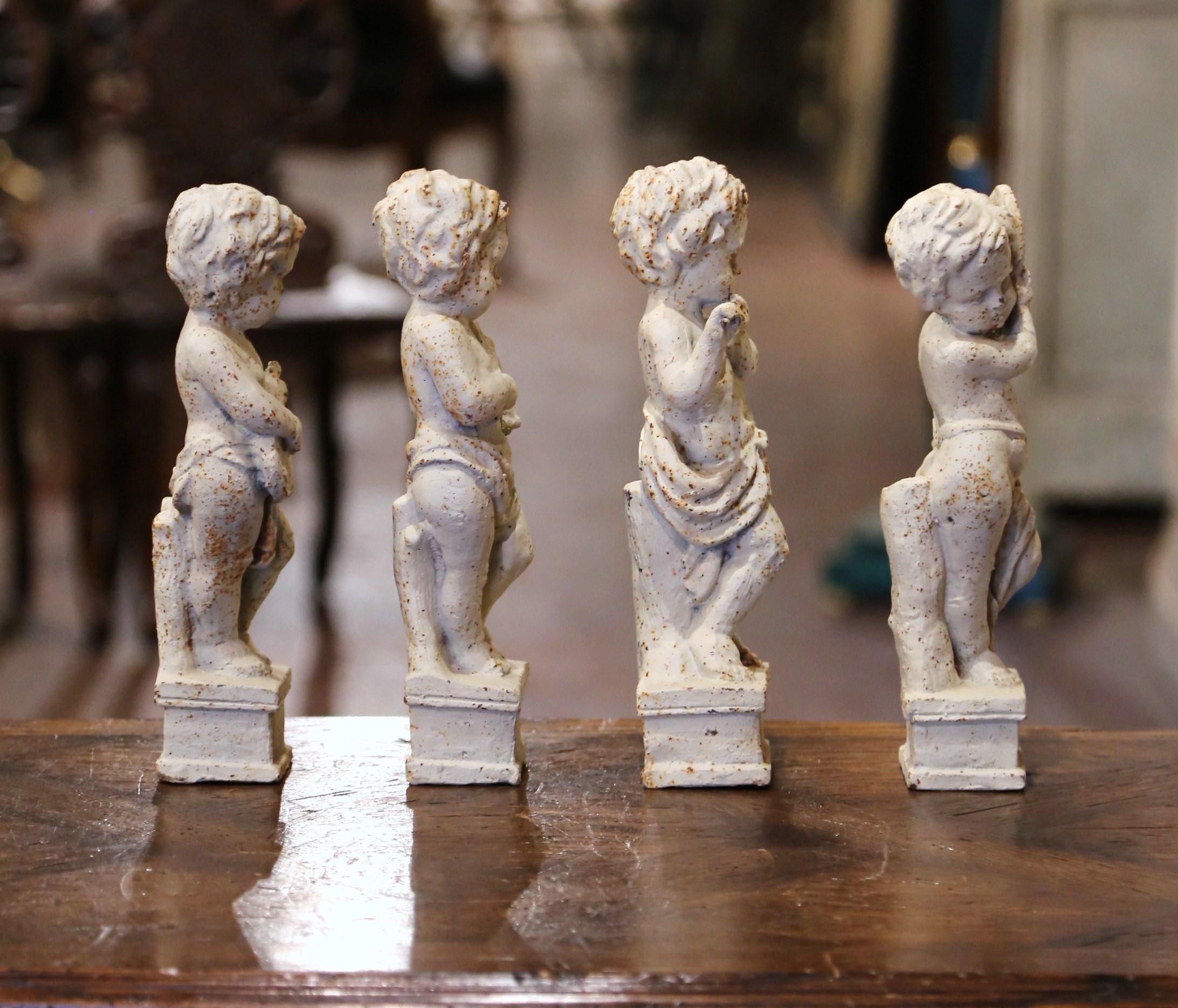 Neoclassical 19th Century French Painted Cast Iron Musical Angelic Cherubs, Set of 4 For Sale