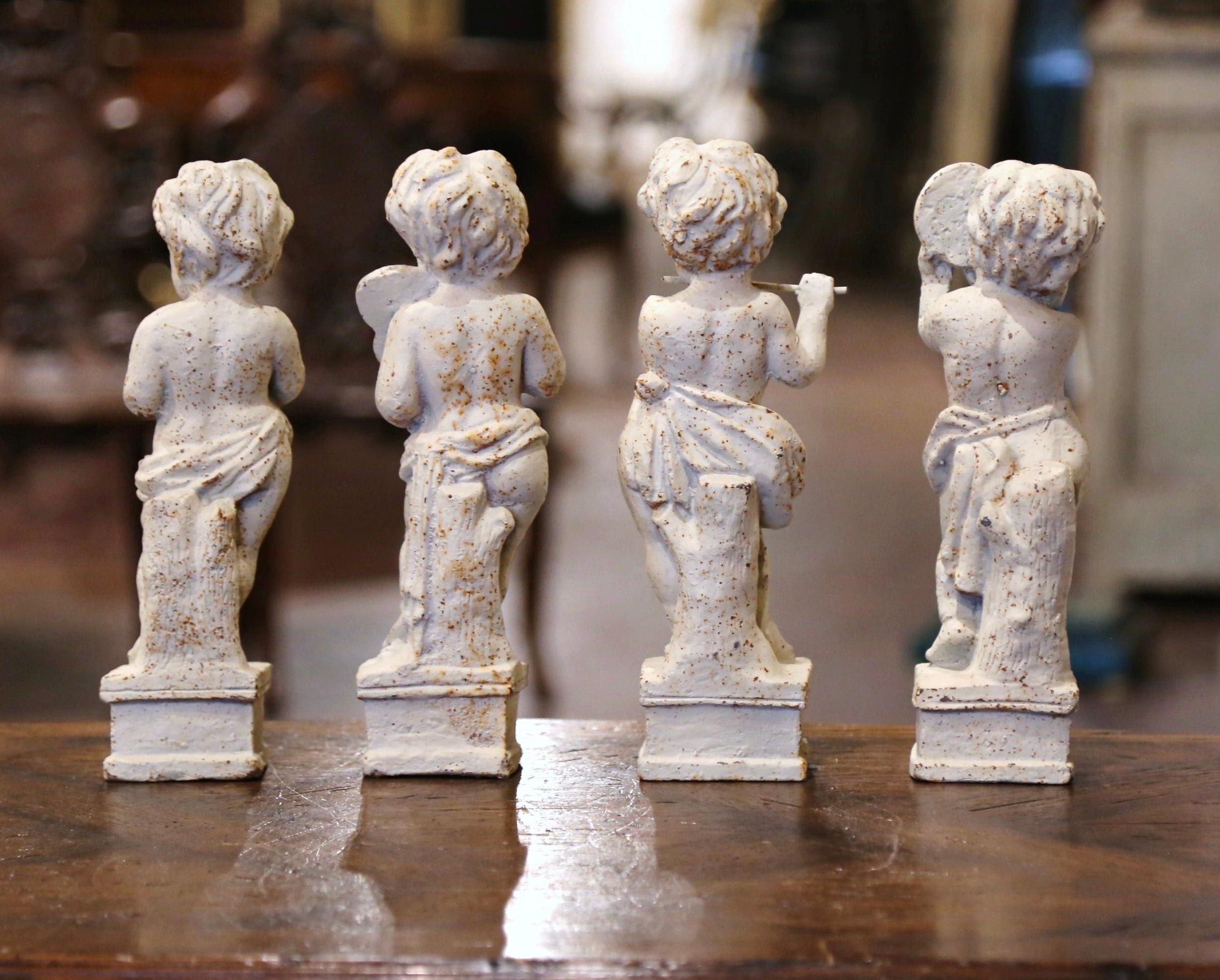 Hand-Painted 19th Century French Painted Cast Iron Musical Angelic Cherubs, Set of 4 For Sale