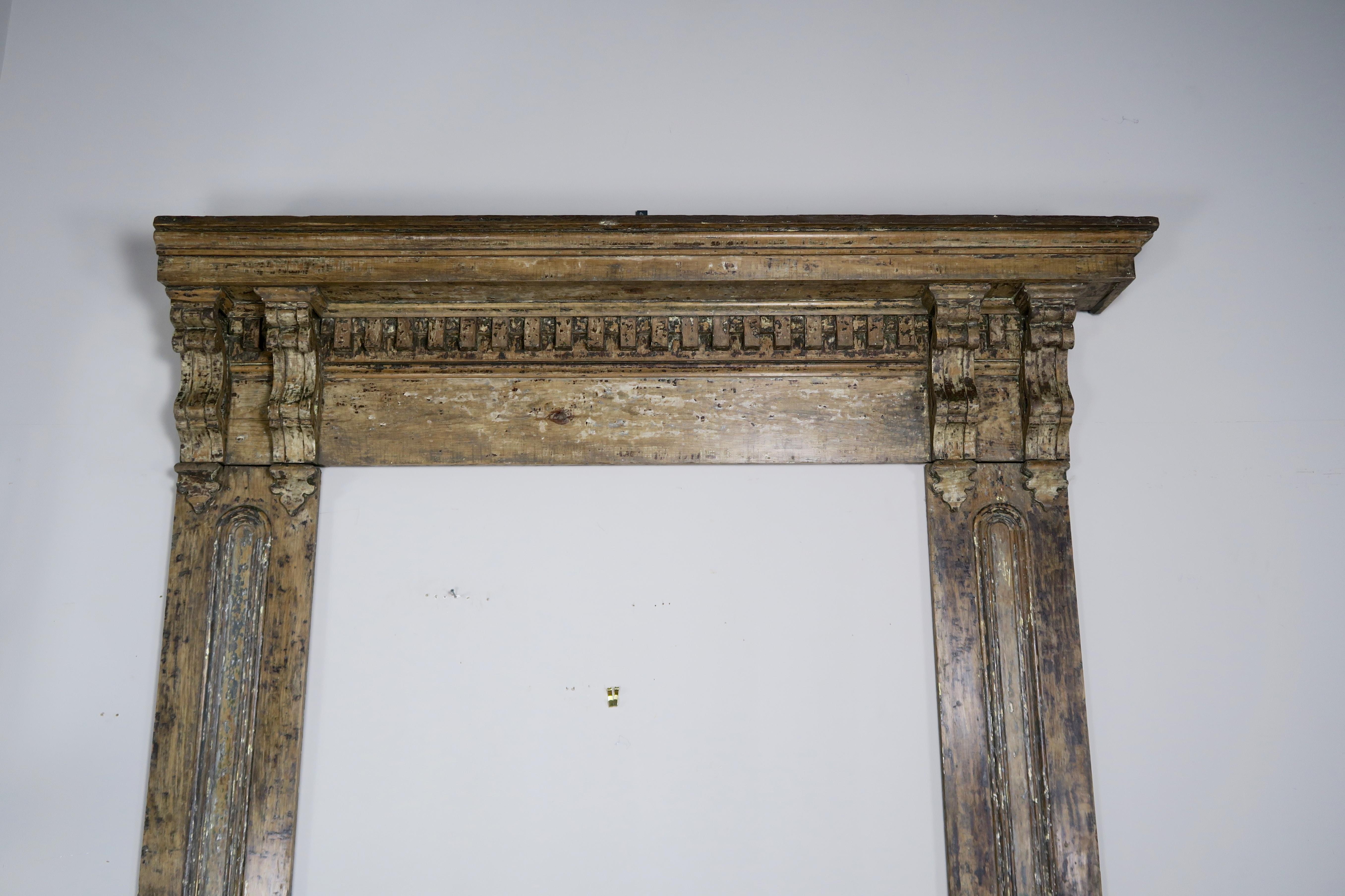19th century French painted door surround with a beautiful worn patina. This surround can be built into your home or a custom mirror or headboard can be created from this fabulous architectural piece.
