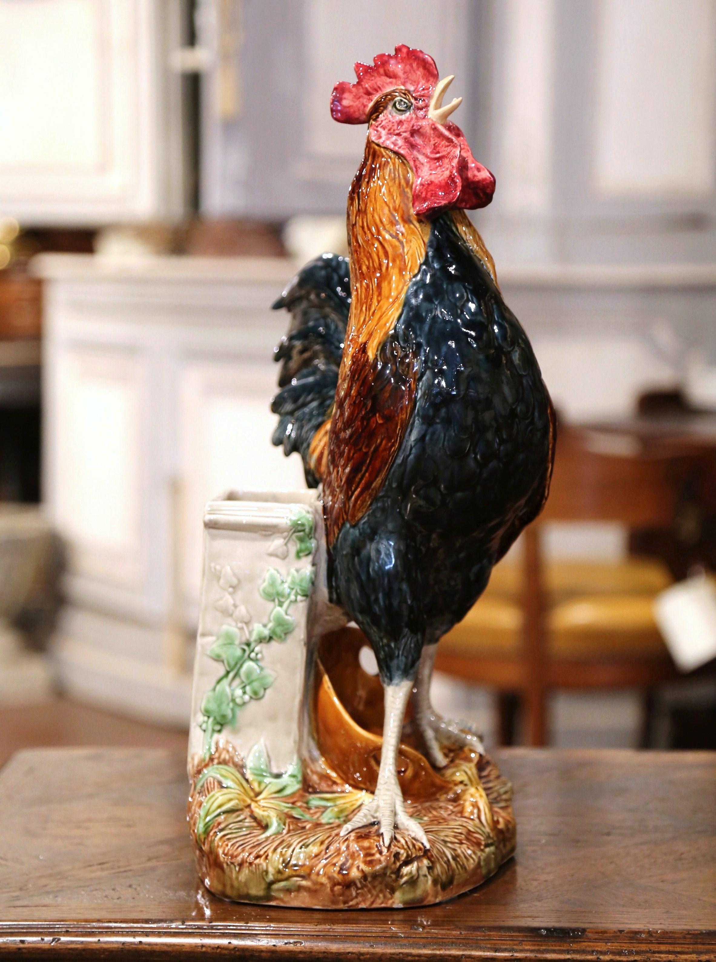 Add the charm of the French countryside to your home with this large, colorful barbotine rooster sculpture. Crafted in Choisy, France, circa 1890, the majolica composition is at once a flower vase and a ceramic rooster sculpture. The elegant piece