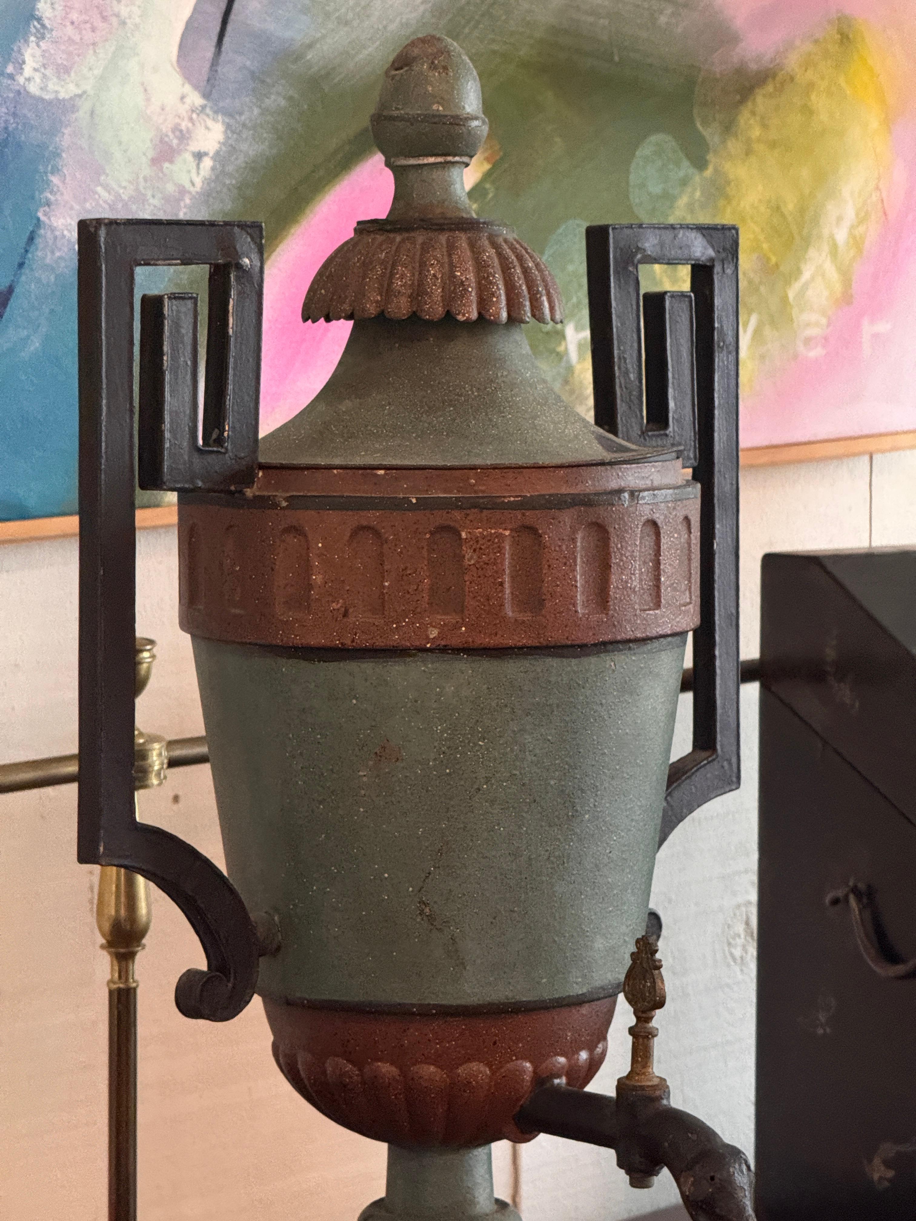 Metallo 19th Century French Painted Tole Urn With Lid and Figural Spout in vendita