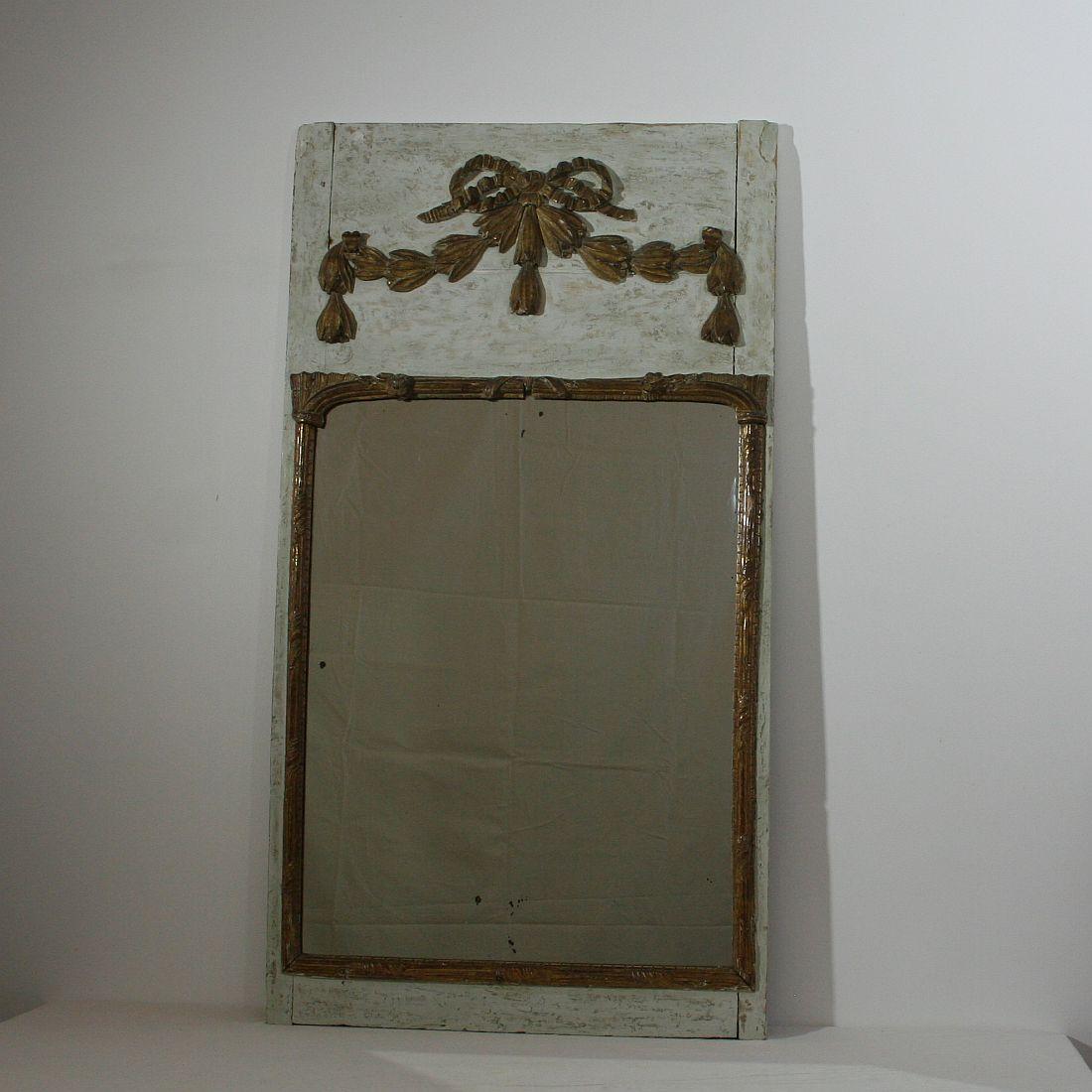 Beautiful 19th century trumeau mirror with great weathered look, France, circa 1800-1850. Weathered, small losses.










       