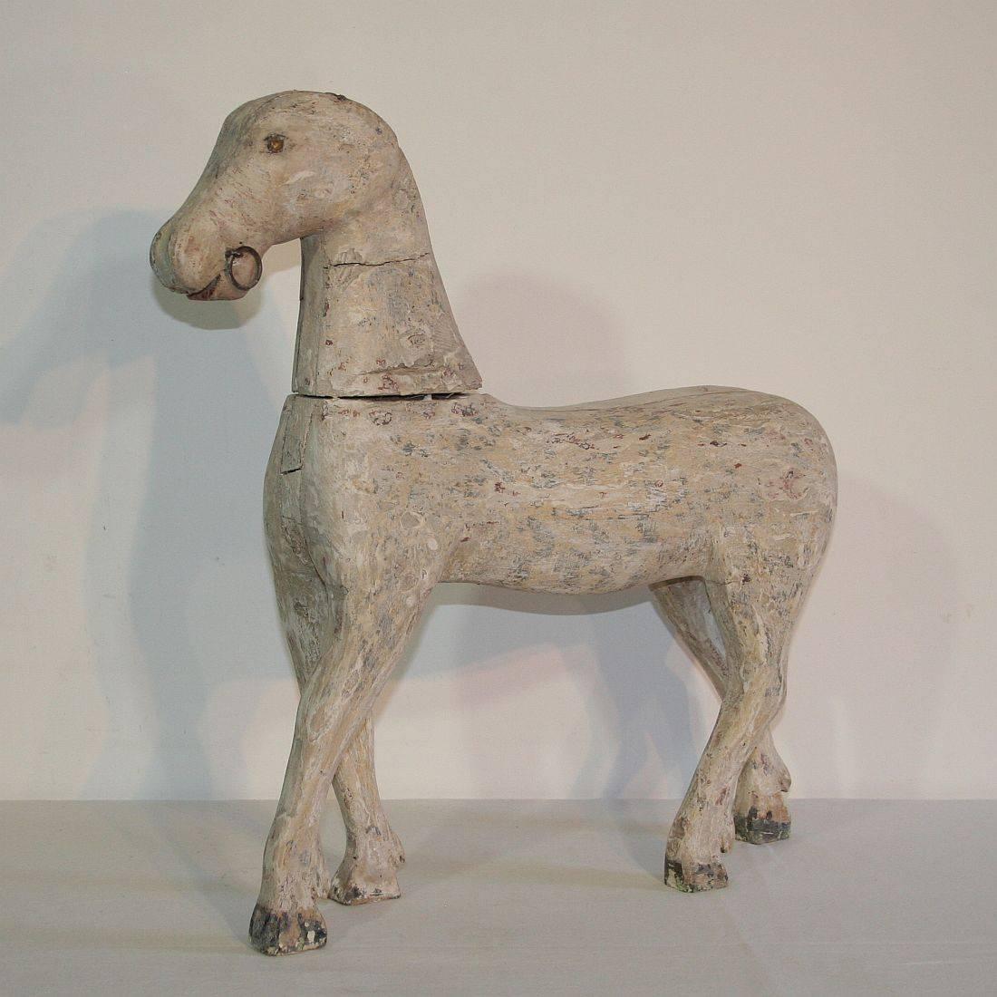 Beautiful wooden horse with great patina, France, circa 1850-1900. Weathered.