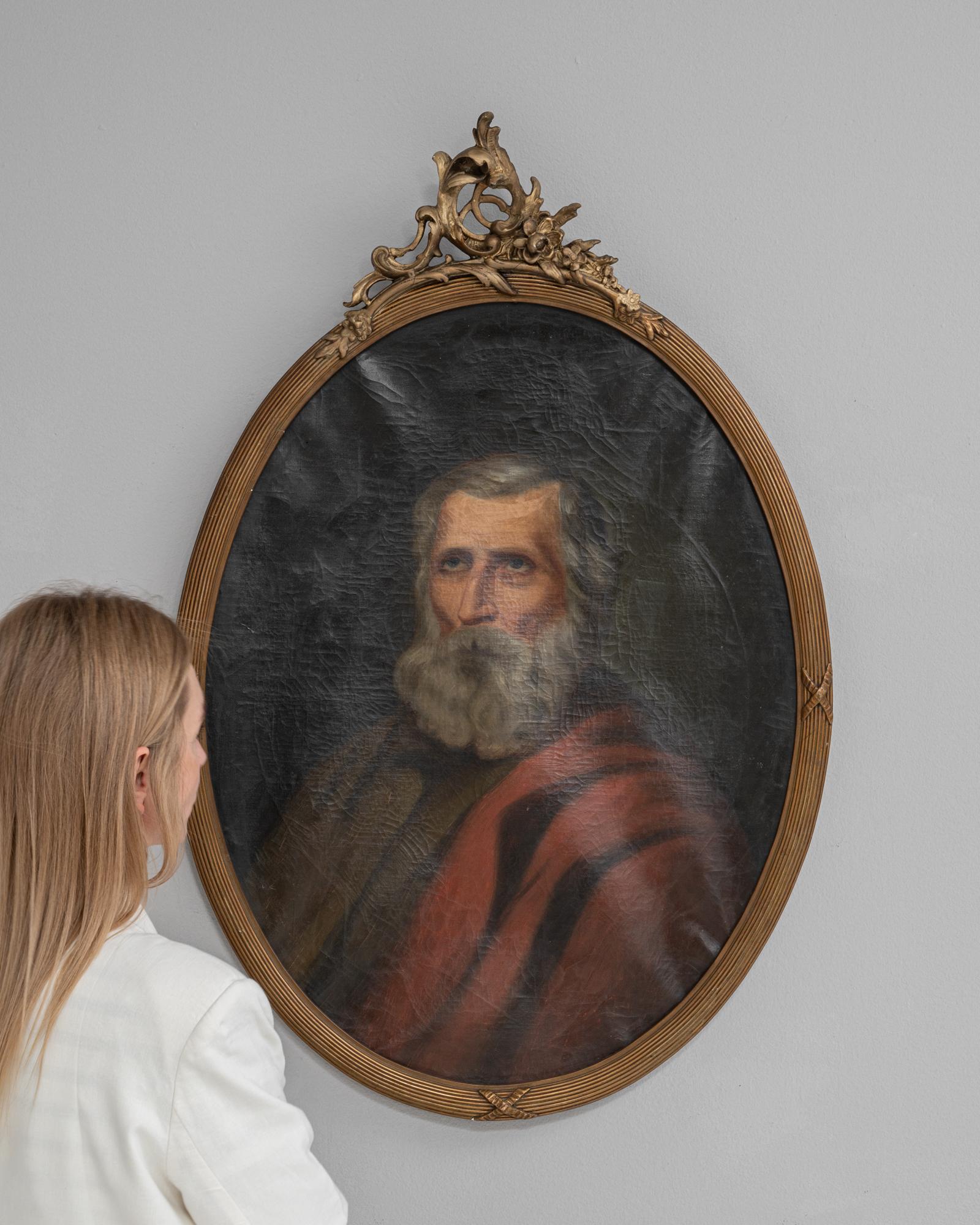This captivating 19th-century French portrait painting exudes classic elegance, featuring the bust of an elderly man with a wise, contemplative expression. Encased in an intricately crafted oval frame, the gold-toned border adds a regal touch,