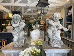 19th Century French Pair of Antique Limestone Cherubs - Les Anges de la Musique