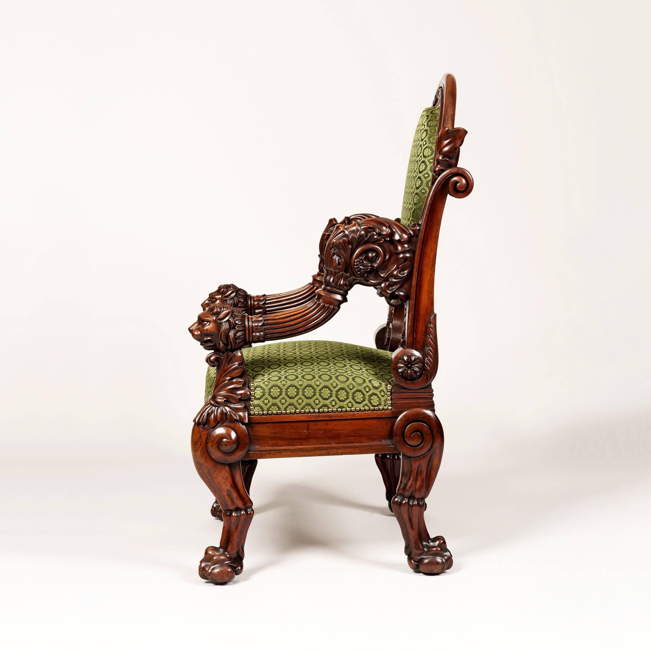 A pair of armchairs stamped Veuve Meunier of Paris

Constructed in a well figured mahogany, which has been excellently carved; rising from addorsed feline claw footed legs to the front and rear, the shaped toprails having carved spandrels and side