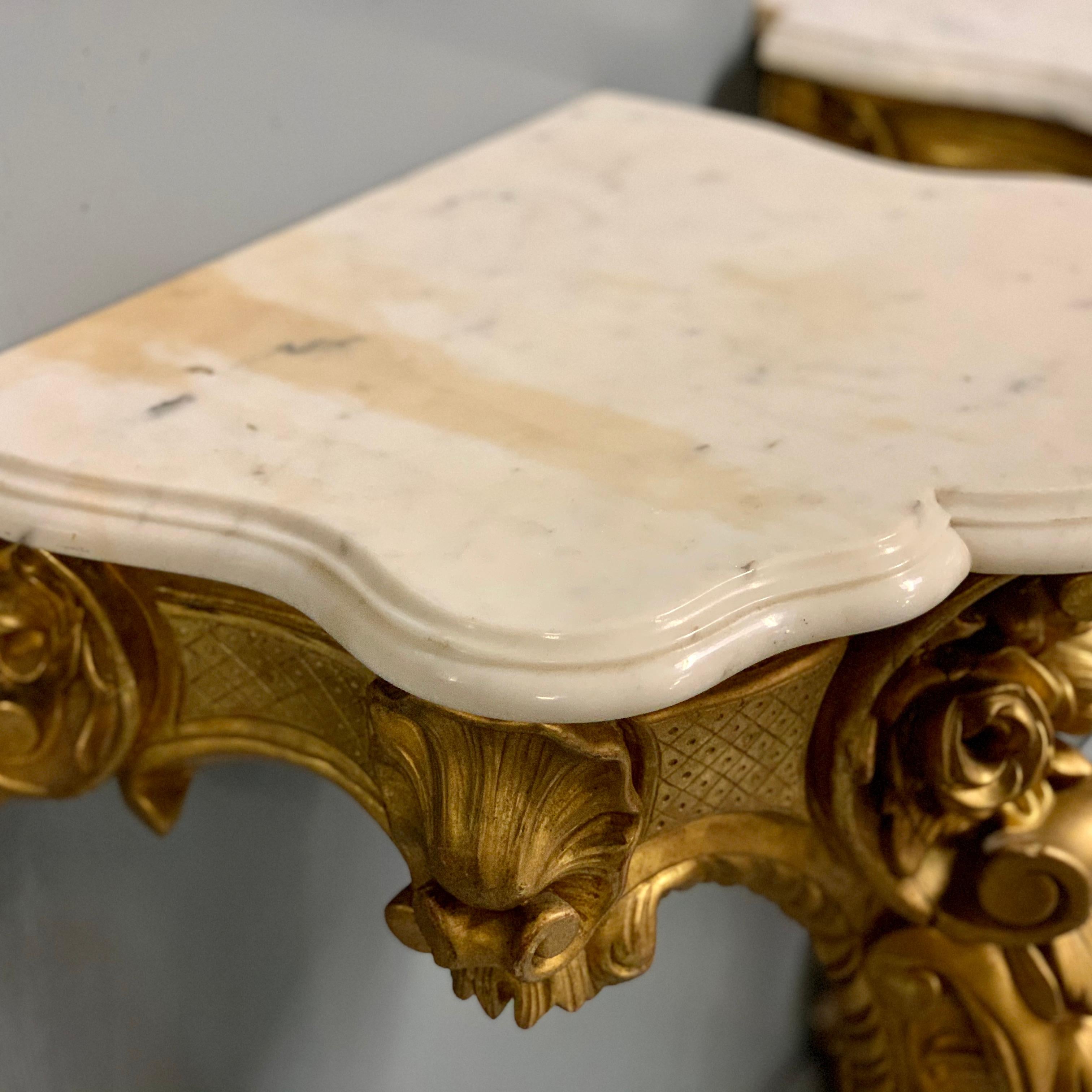 Carrara Marble 19th Century French Pair of Gilt Wall Mounted Console Tables with Marble Tops For Sale