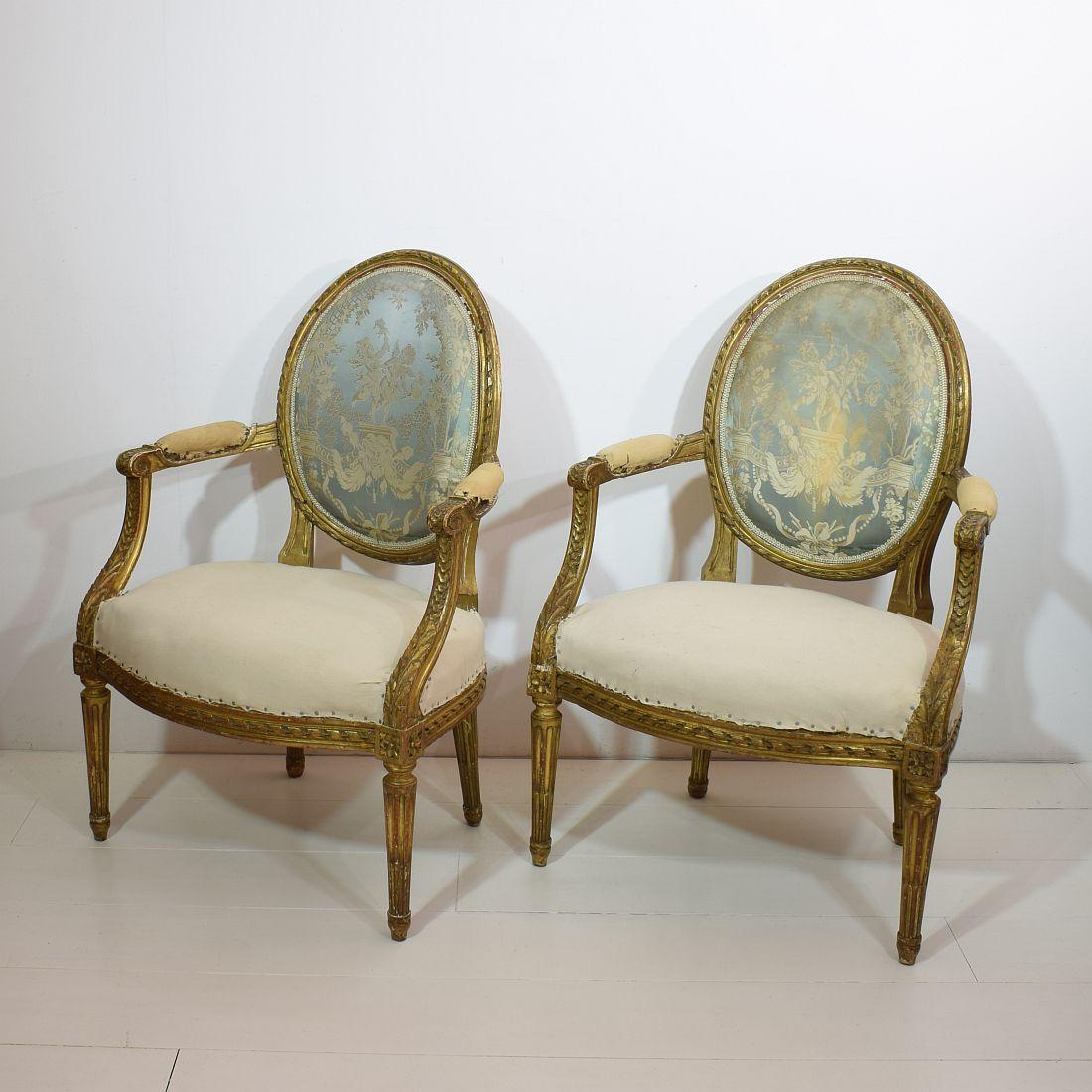 Really stunning pair of Louis XVI style chairs with beautiful weathered gilding
France, circa 1880. Despite of their age, the chairs are in a good condition but of course need new lining.
Seat height is 41 cm. Weathered, small losses and old