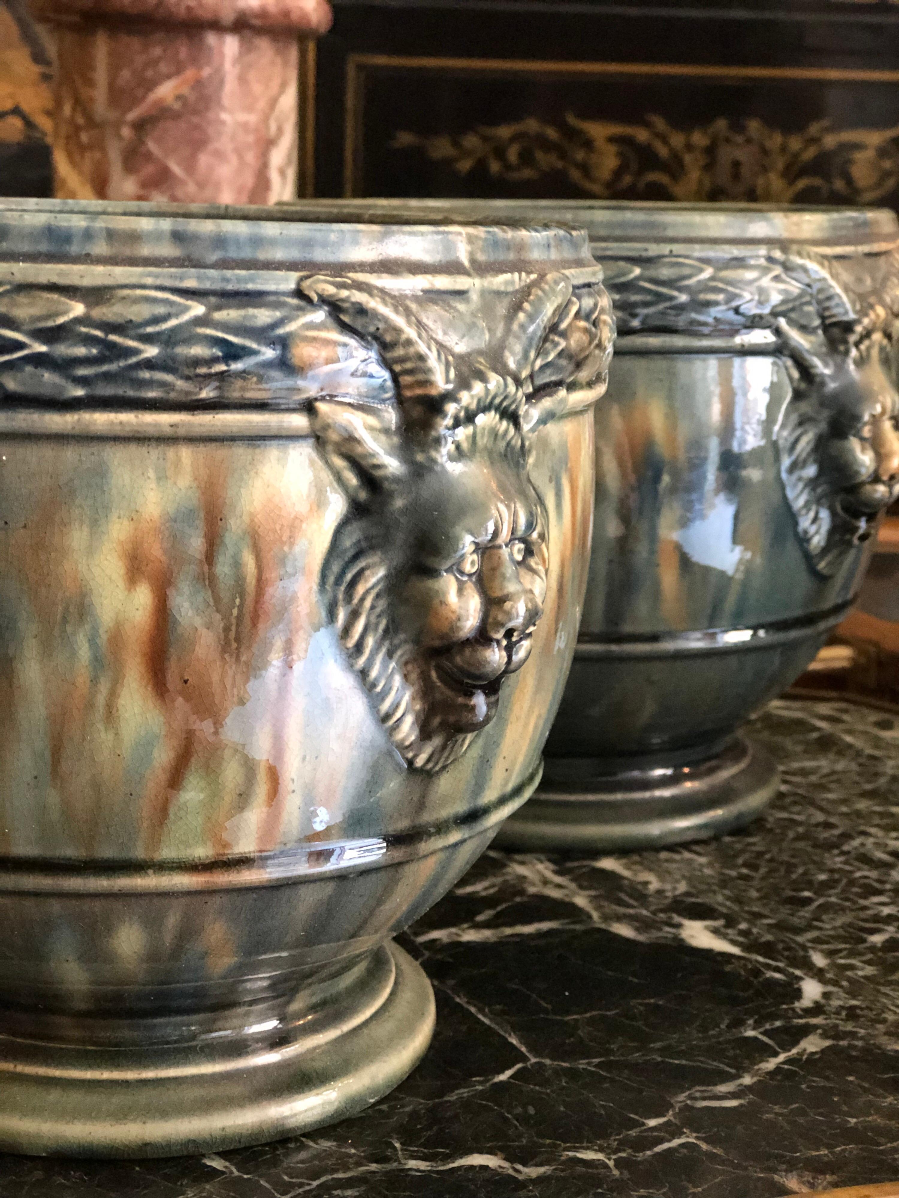 19th century ceramic pots with animal's heads in green glaze in very good condition.