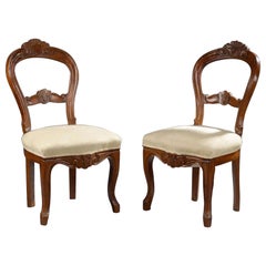 19th Century French Pair of Mahogany Hand Carved Chairs with Round Backrests