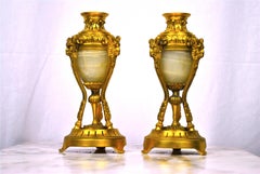 19th Century French Pair of Ormolu and Onyx Candlesticks with Finial Tops