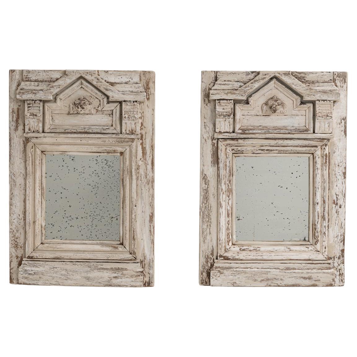 Coppia di specchi francesi del XIX secolo in legno patinato bianco