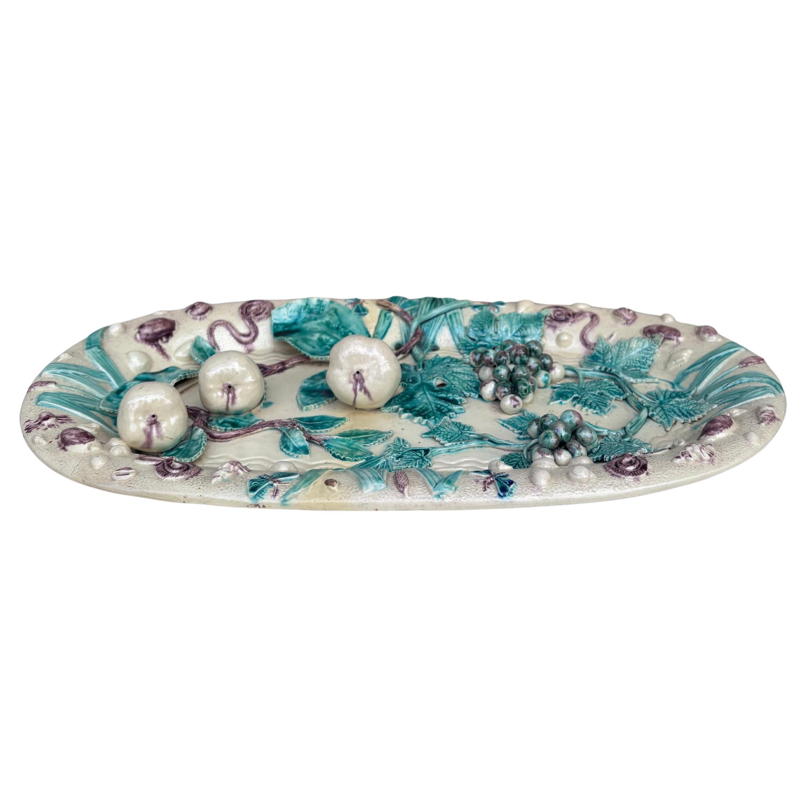 Large 19th Century French Palissy Majolica platter signed Saint Honore Les Bains.
Decorated with pears,grapes,bugs and leaves.
16 inches L
9.2 inches H