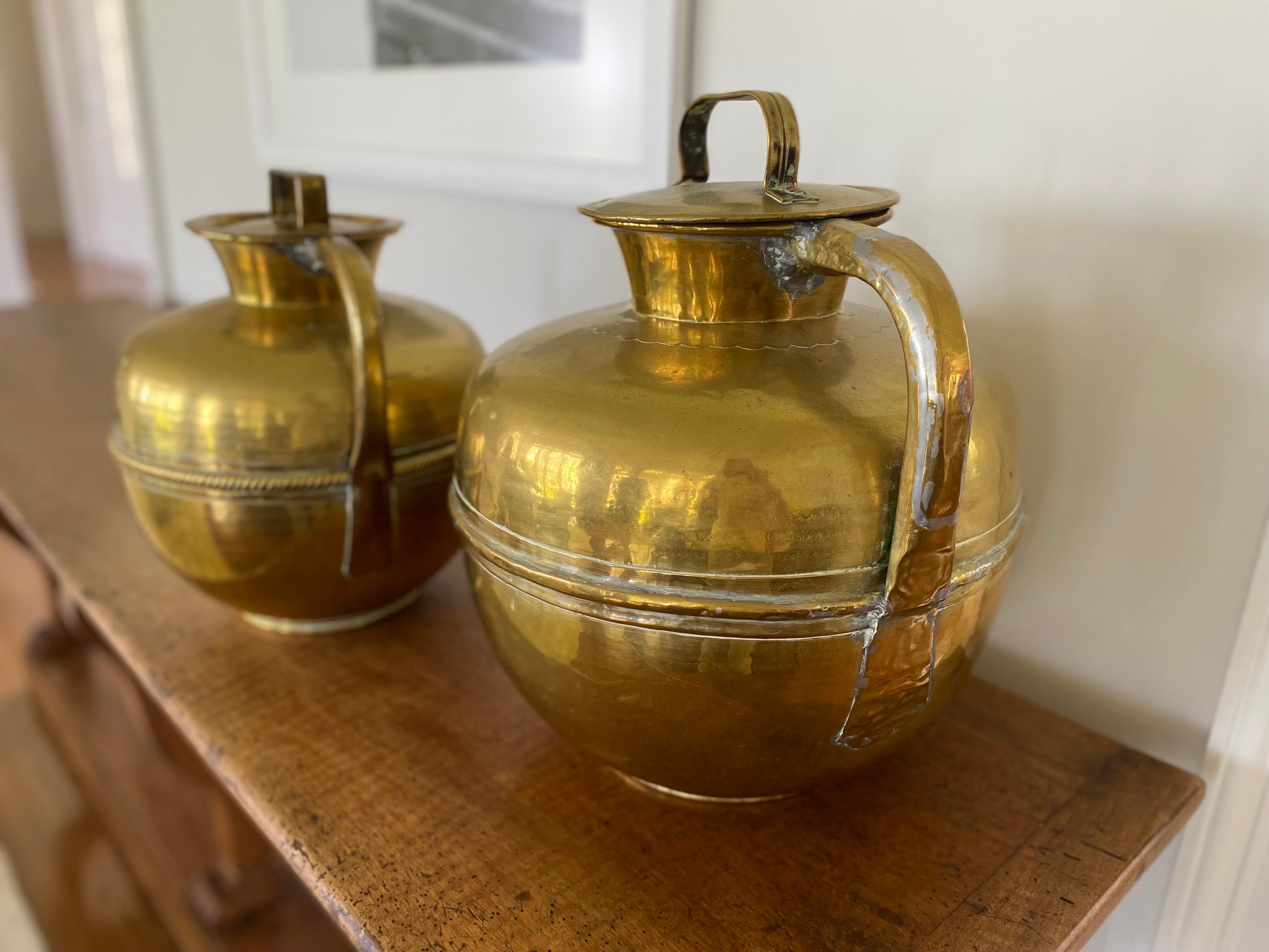 19th century French patinated brass milk jars with top from Rouen. Beautiful patinated brass with tops and handle.
Lg size: 14.5