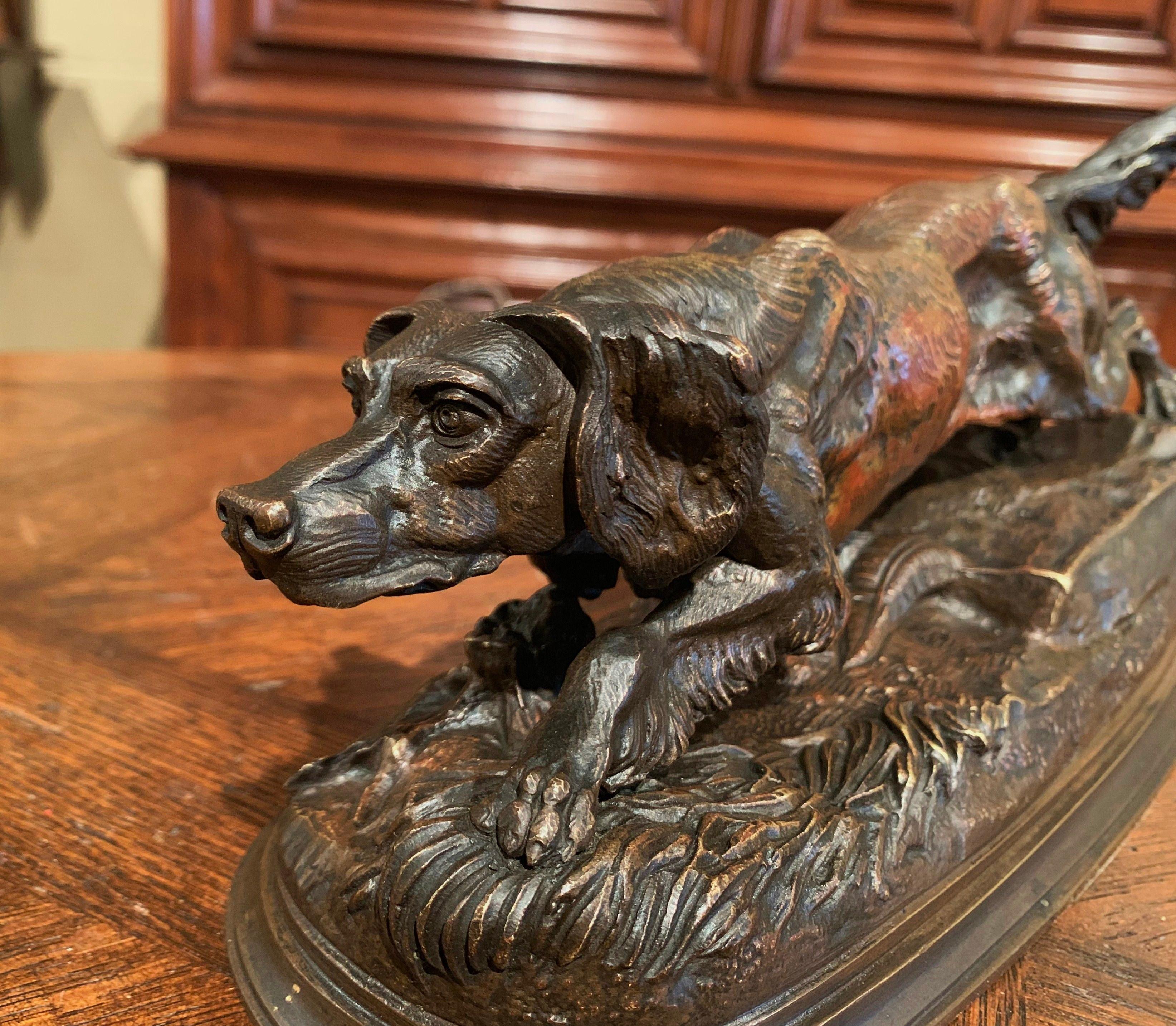 Decorate an office shelf or a man’s study with this antique bronze sculpture; created in France, circa 1890 in the manner of Jules Moigniez or Thomas Cartier, the composition features a pointer walking on rocky ground and sniffing a bird. The canine