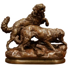 Sculpture française du 19ème siècle en bronze patiné représentant des chiens de chasse signées Charles Valton