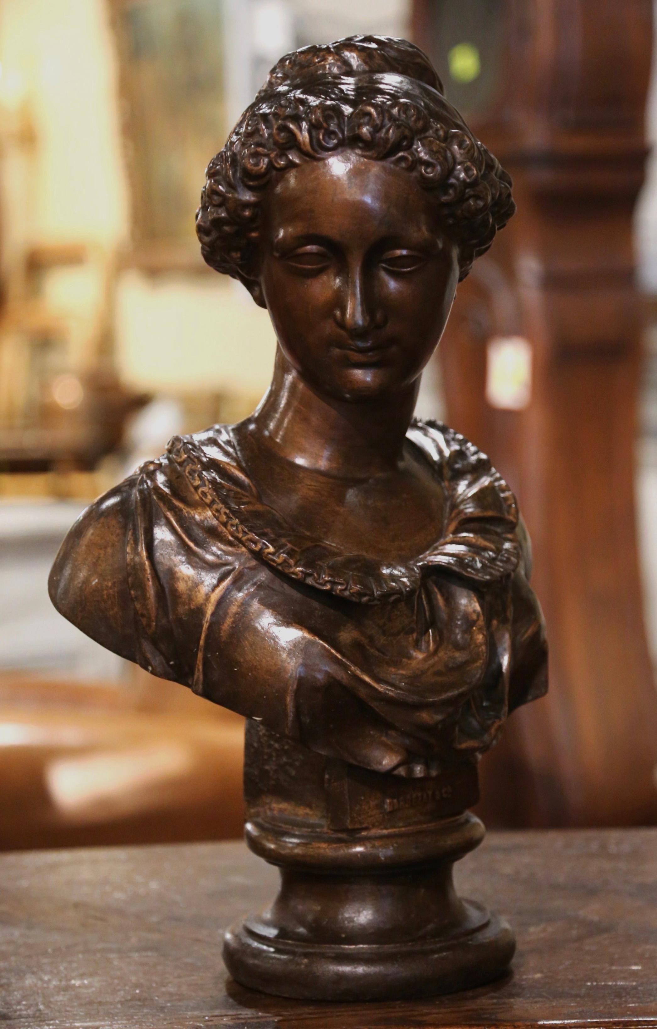 This elegant bust was sculpted in France, circa 1880. The sculpture sits on an integral round base and depicts a young beauty in traditional Louis XVI clothing; the art work is signed on the front 