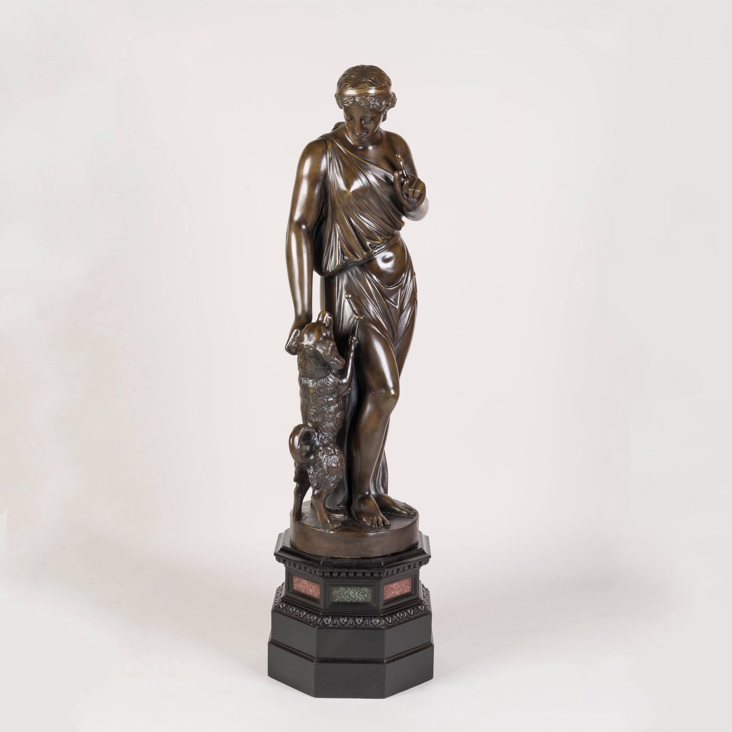 Figura de escayola patinada francesa del siglo XIX y su perro Francés en venta