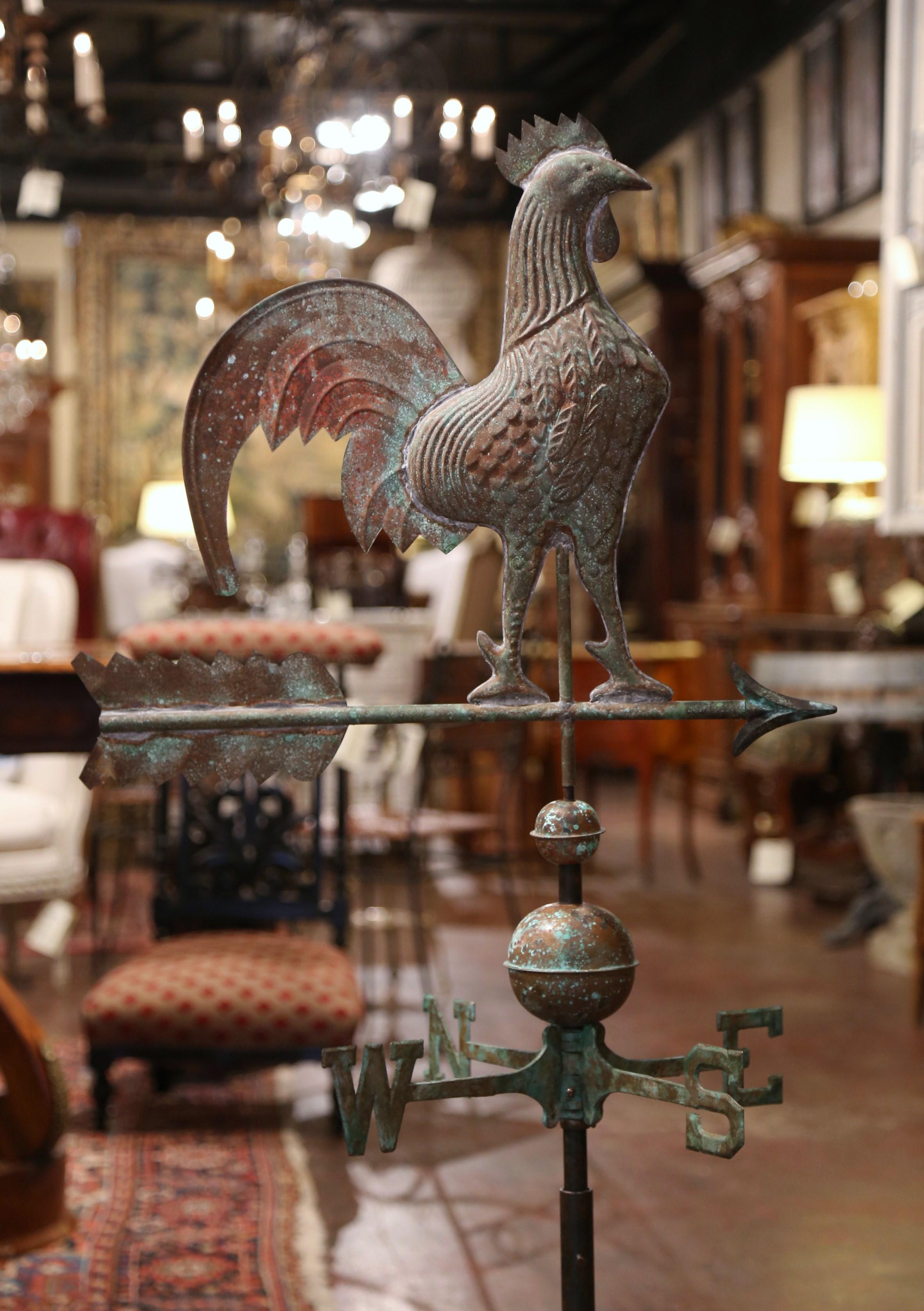This elegant tole weather vane was created in Normandy, France, circa 1860. The traditional weather vane features a Classic swivel French chanticleer rooster standing on an arrow; below, the four points of the compass which swivel as well according