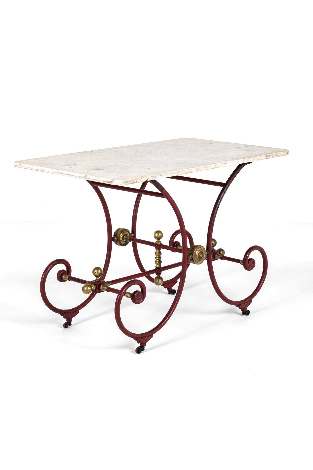 A good 19th century patisserie or butcher table of good size with the original marble top with rounded edges.

The top bears signs of use but is in excellent and clean condition with no cracks or splits. The top can be removed easily for simpler