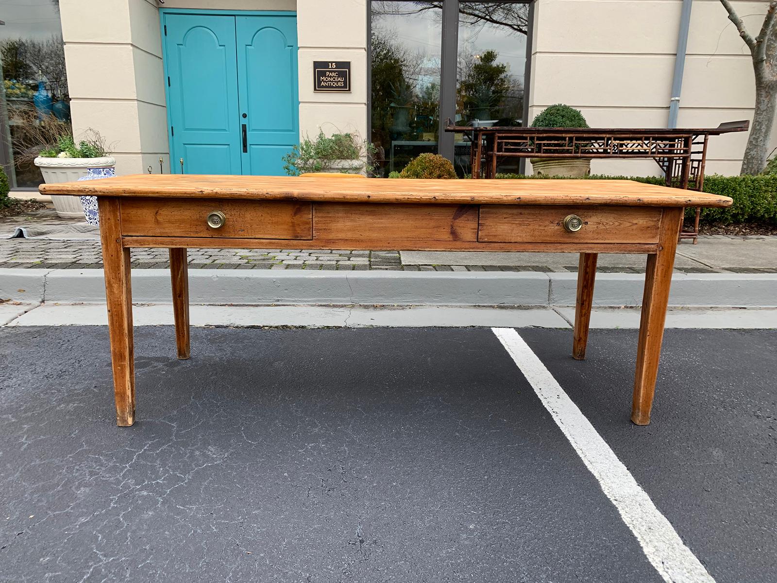 19th century French pine farm table with two drawers
Charming color
Lion heads on drawer pulls
Measures: 78.25