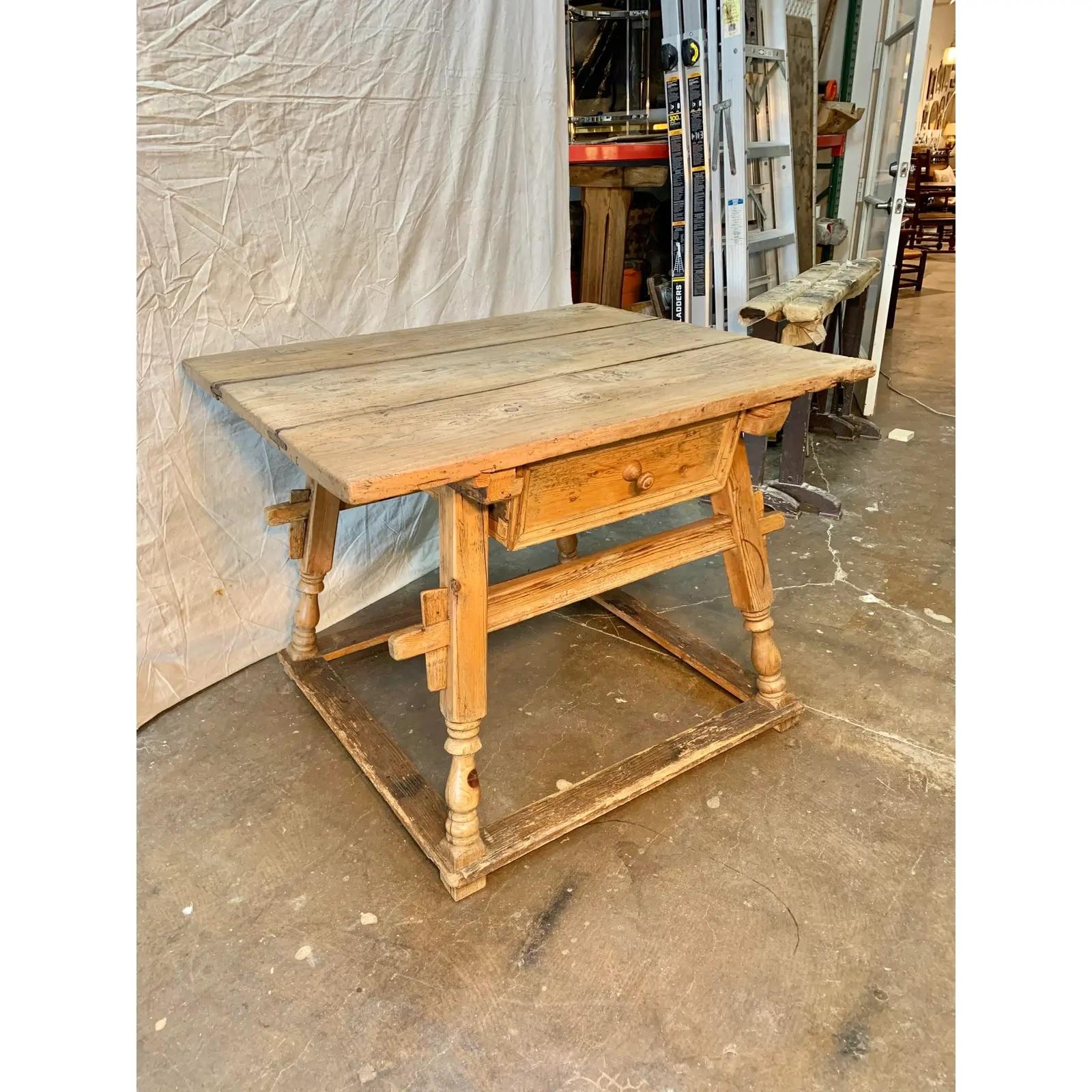 This French Pine Merchant or Bankers Center Table was handmade in the 1800s. The table features a 1.25