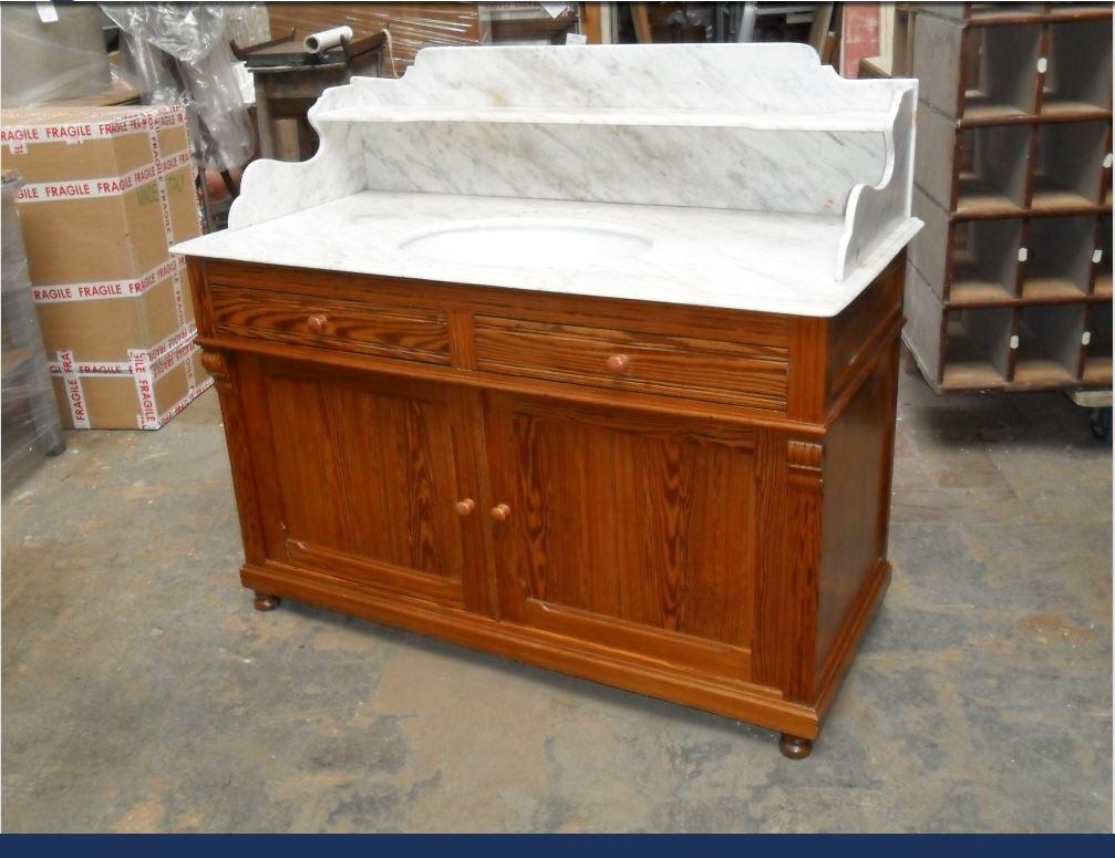 19th century French pitch pine cupboard sink with its original Carrara marble top, 1890s.
This piece was a console converted into sink.
Eventual spots on the marble are due to age and use.
Faucets to be quoted on demand.
Measures: Depth cm 60,