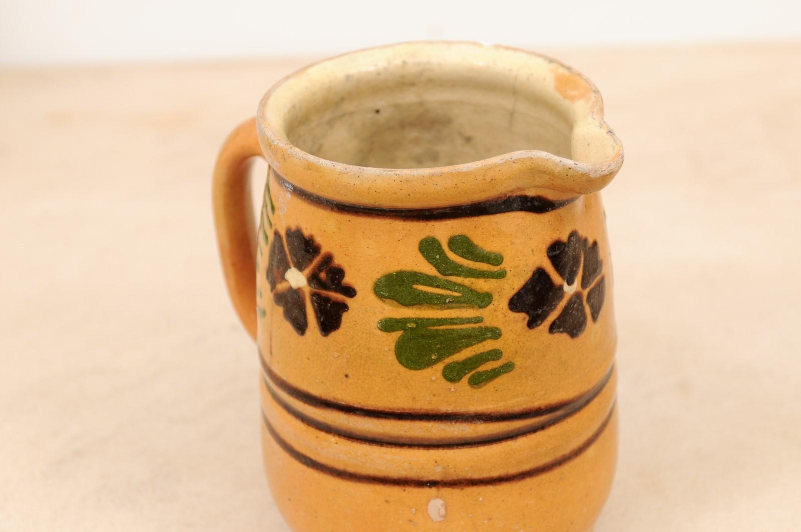 Glazed 19th Century French Pitcher with Yellow, Brown and Green Glaze and Pansies