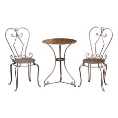 19th Century French Polished Iron Pedestal Table and Two Matching Chairs