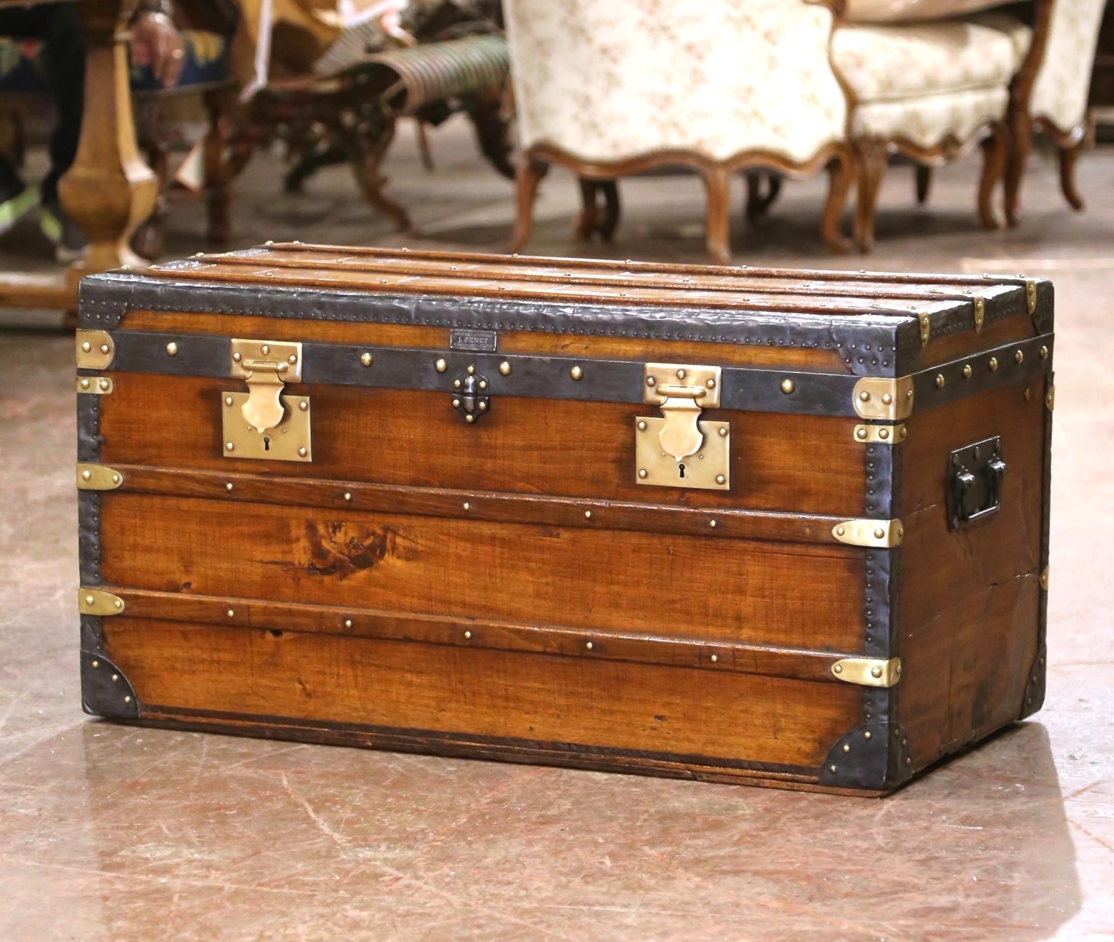 This exceptional 19th-century French travel trunk was crafted in Paris circa 1895 by J. Penet, a respected maker of fine articles de voyage located at 52 Rue Lafayette. Known for producing high-quality trunks and travel accessories during the Belle