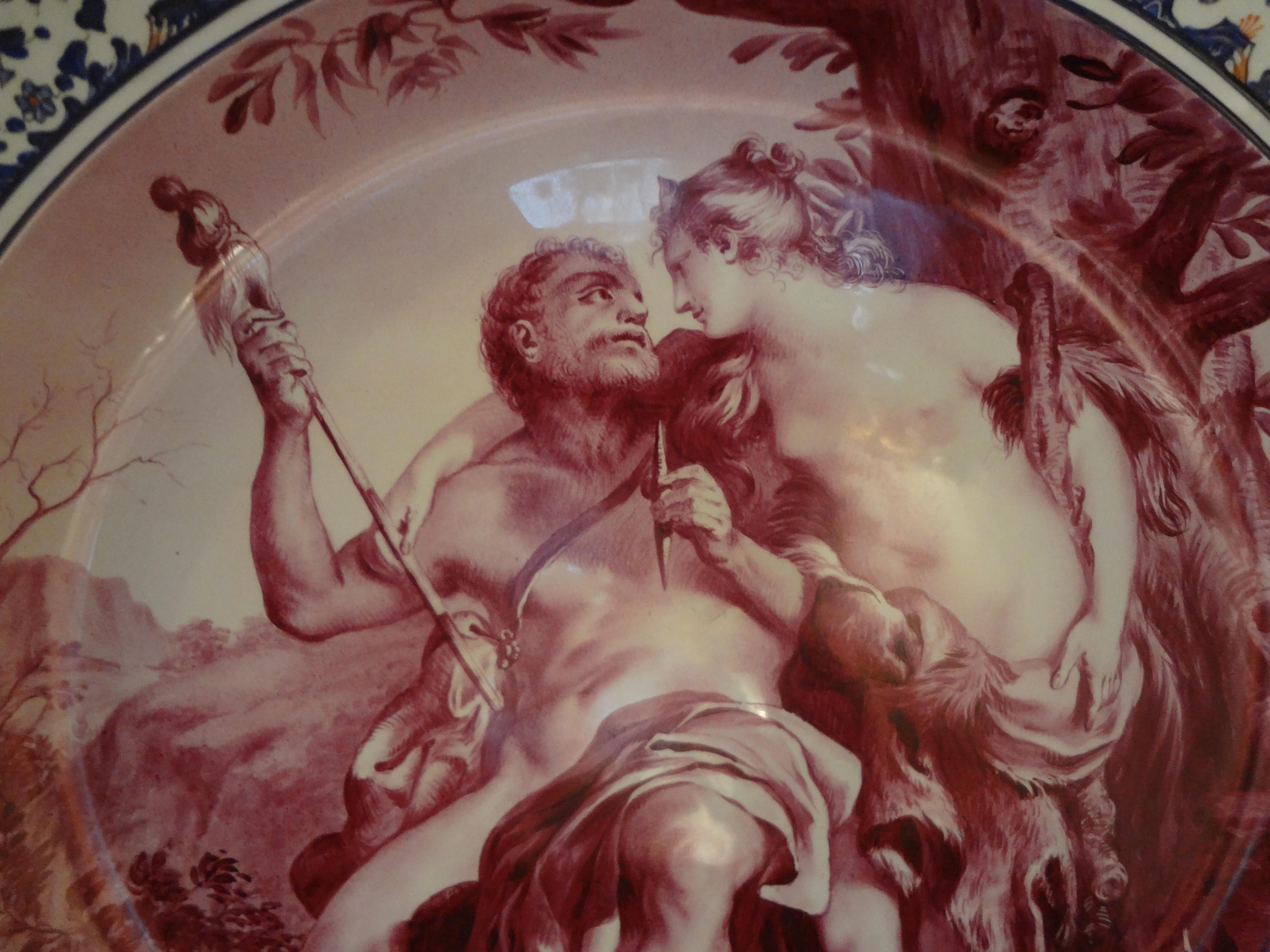 19th century French porcelain Allegorical charger.
Stunning 19th century French hand decorated, artist-signed allegorical porcelain charger.
This beautiful well executed faience charger depicting Hercules is executed in unusual burgundy and dark