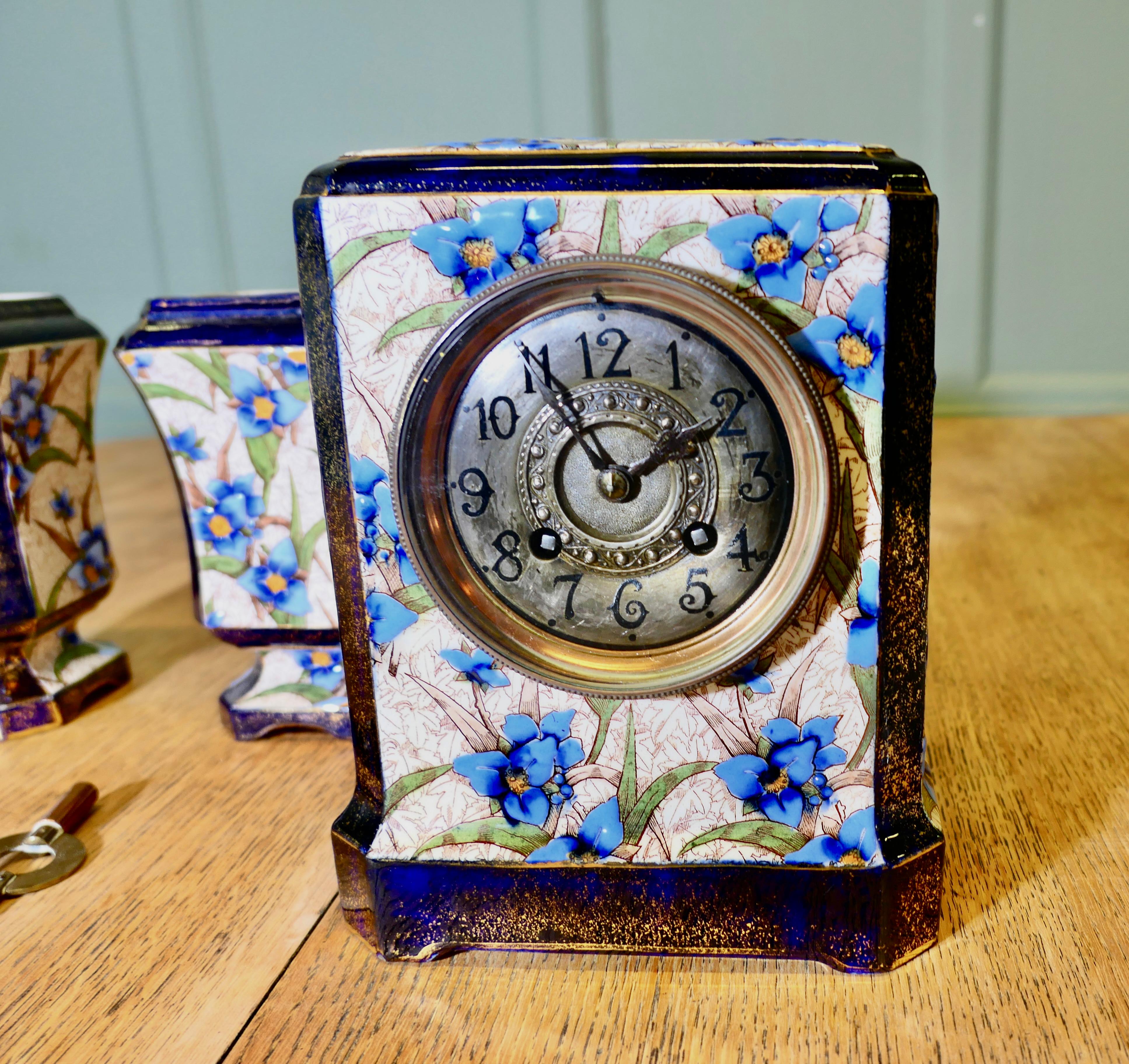 French Provincial 19th Century French Porcelain Clock Set For Sale