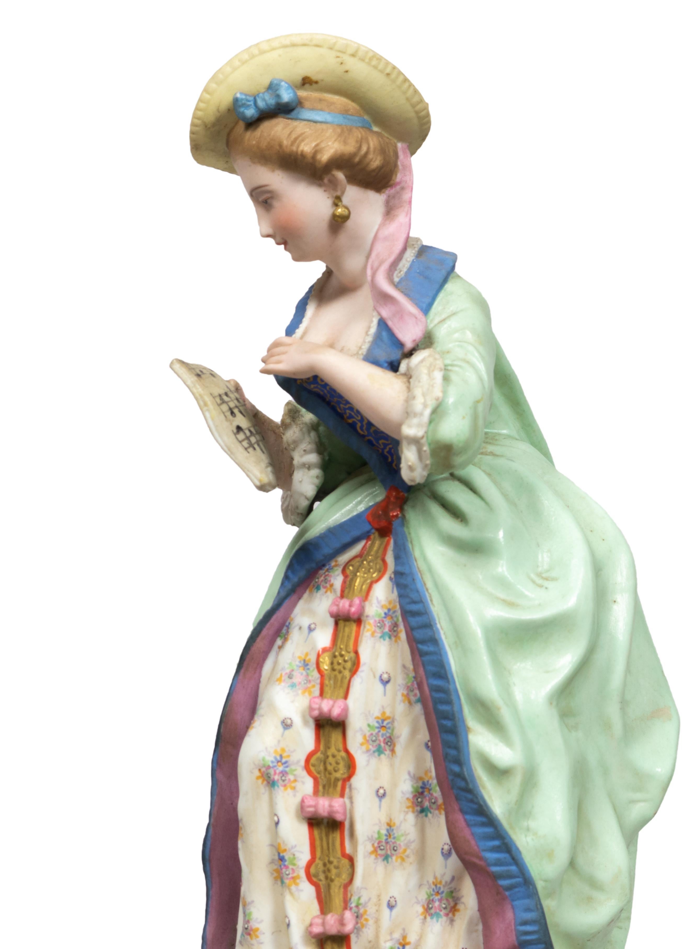 Peint à la main Figurines en porcelaine française du 19e siècle Joueur de guitare et Singer en vente