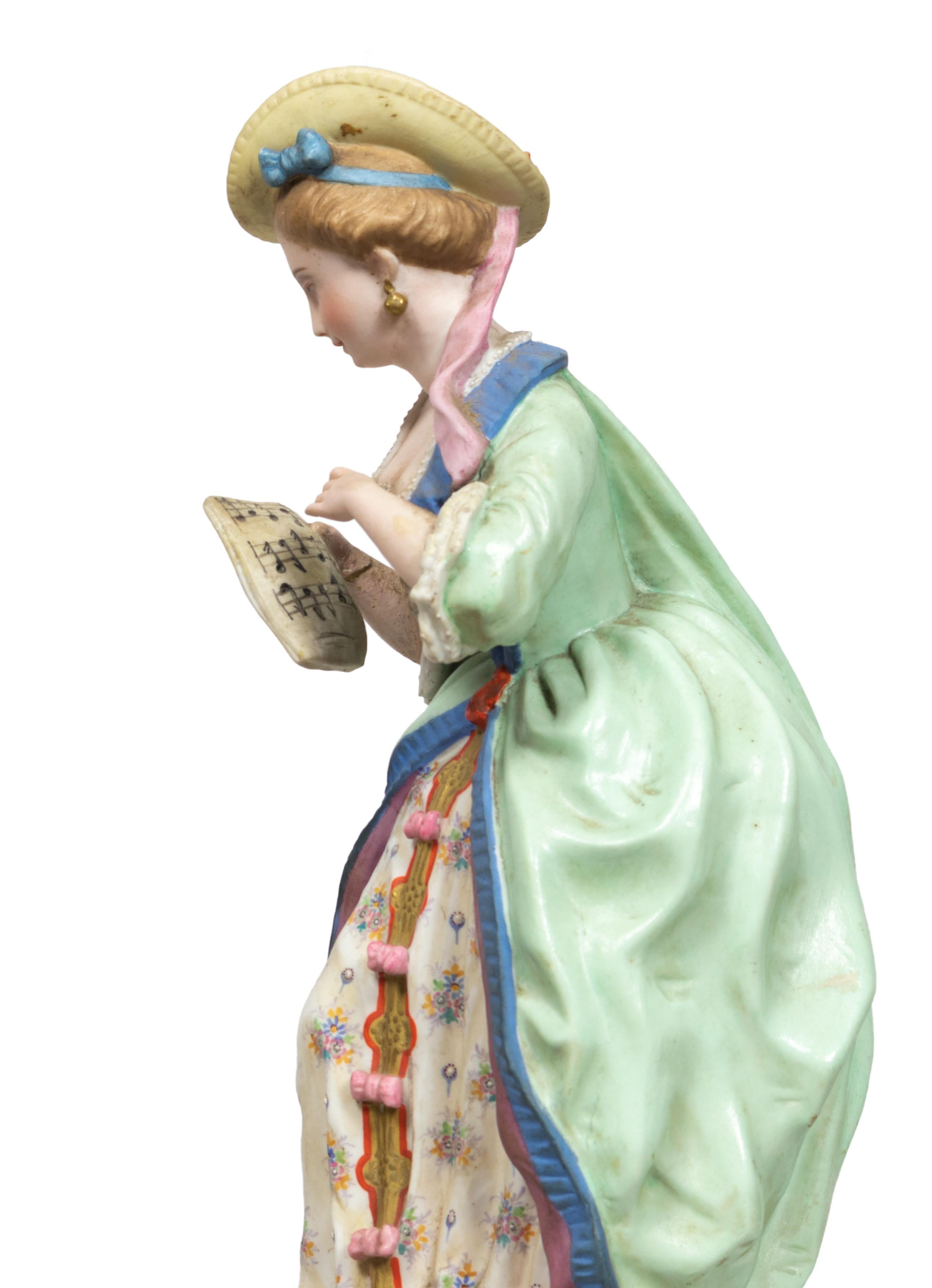 Figurine di porcellana francese del XIX secolo Suonatore di chitarra e cantante in vendita 1